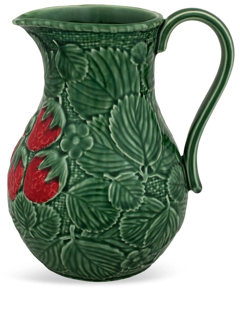 Make your drinks a little sweeter with this ceramic strawberry pitcher. This pitcher is made by master ceramics atelier Bordallo Pinheiro, which was founded in Caldas da Rainha, Portugal, in 1884.Handmade ceramic pitcher Limited edition Dimensions: 8.7" x 5.9" x 7.3" Capacity: 74 oz.
