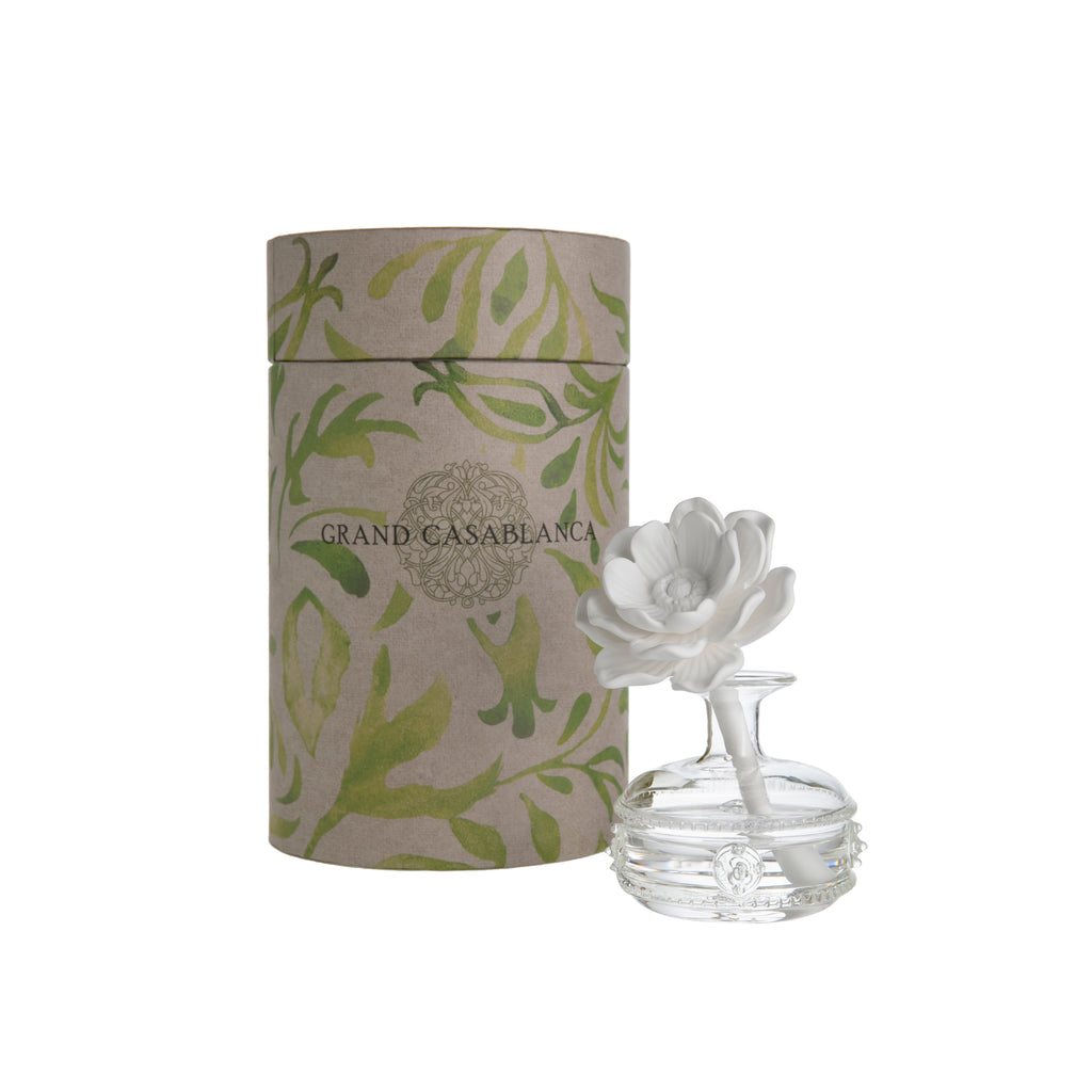 This elegant, vintage-styled porcelain diffuser is a beautiful addition to any room. There’s no need for reeds—the porcelain flower is designed to draw in the oil and diffuse the fragrance throughout the room. Fragrance oil volume: 6.76 oz. Materials: porcelain, glass, Dimensions: 4" x 7" Gift box dimensions: 5" x 10".