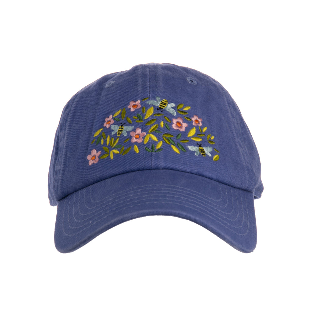 This pretty periwinkle baseball cap is perfect for, avid gardeners, yoga class devotees, golfers, dog walkers, runners and more! Featuring colorful & charming bees and flowers embroidery on the front and back. An adjustable metal buckle ensures the perfect fit. Materials: Cotton, Metal One size. Adjustable buckle.