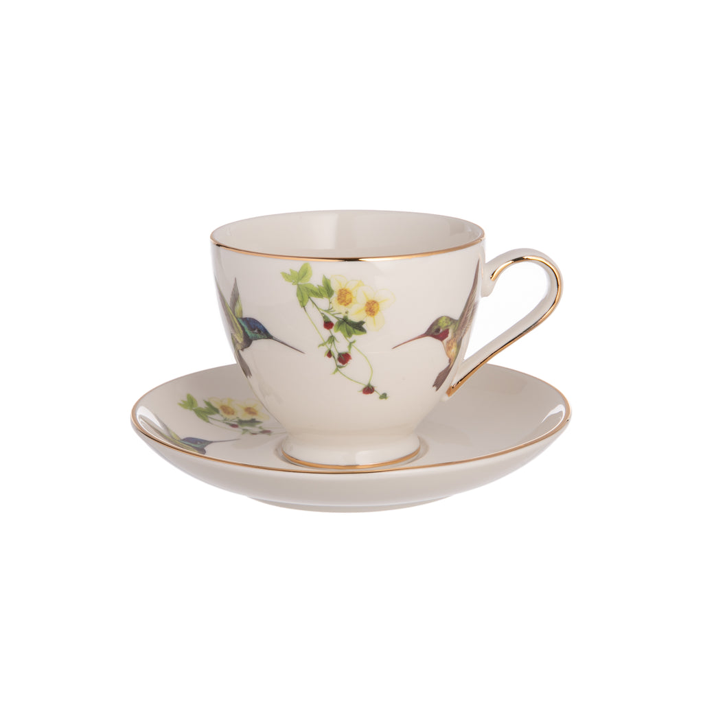 This delightful teacup and saucer set is made from fine bone China and is adorned with a charming hummingbird motif. It is finished with luxurious 10K gold accents, making it a great way to add a touch of elegance to any tea party. Material: Fine bone China Capacity 6.5 oz. Dimensions: 3" x 5.5".