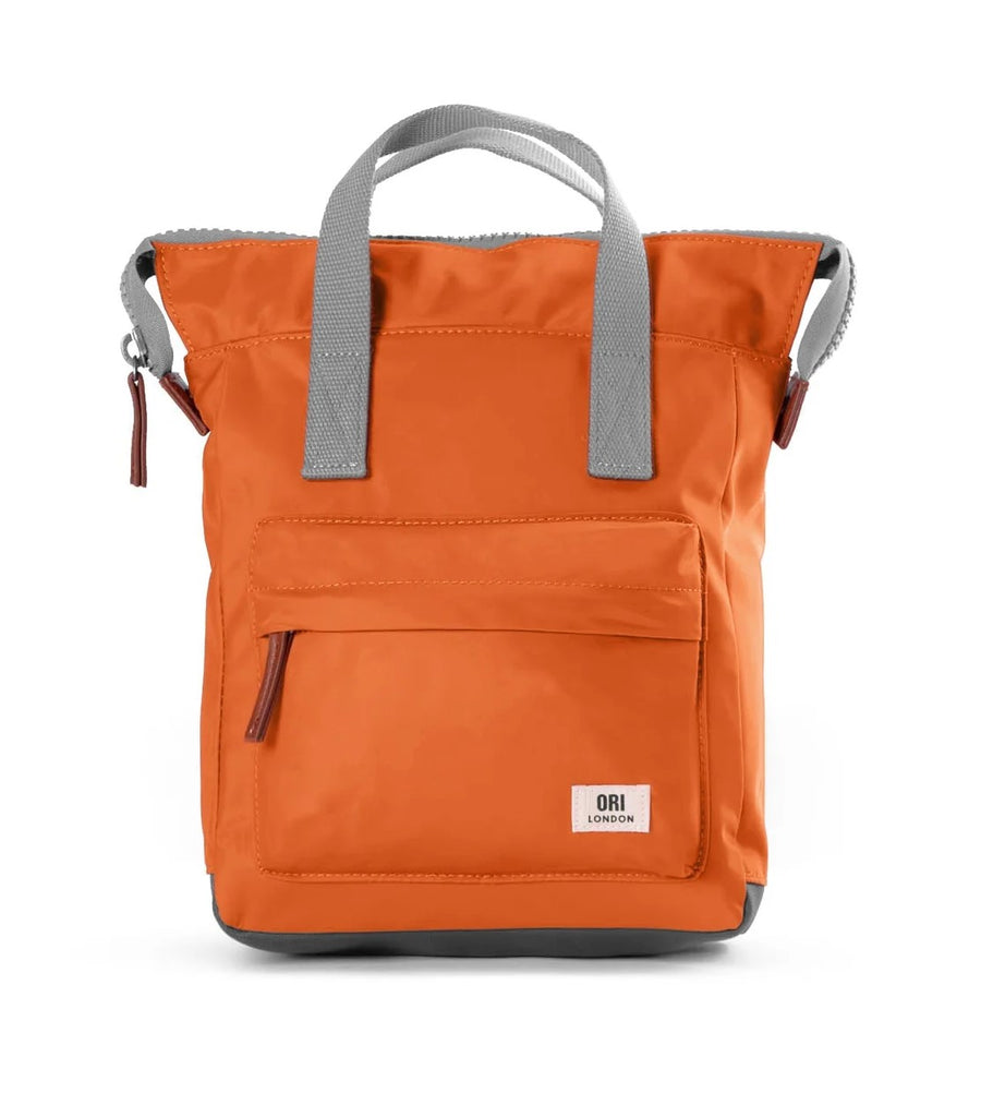 Rugged, tough, kinder to the environment and good looking! This versatile backpack can be carried comfortably on your back or by your side using the hand straps. It features a front pocket closed by a sturdy zip, a secure inside pocket, and a laptop/tablet sleeve inside. Dimensions: 15.7" x 11.8" x 4.7".  Vegan.