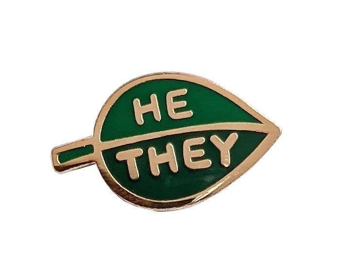 This two-tone enamel leaf he/they pronoun pin allows you to communicate your preferred pronouns in a cute and subtle way. Pin to lapels, backpacks, sneakers and more! Materials: metal and enamel Pin fastening with rubber stopper Dimensions: 1" x 1.5"