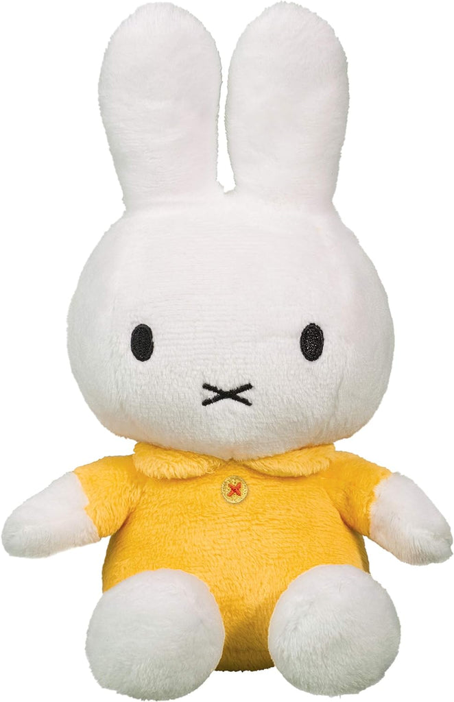 Featuring a vibrant, yellow dress and her famous crisscross mouth, Miffy the white Bunny looks as if she's stepped out from the pages of a storybook. Irresistibly soft and emotionally engaging, Miffy's small size makes her ideal for little hands and big adventures. Dimensions: 9" x 4" Suitable from birth.
