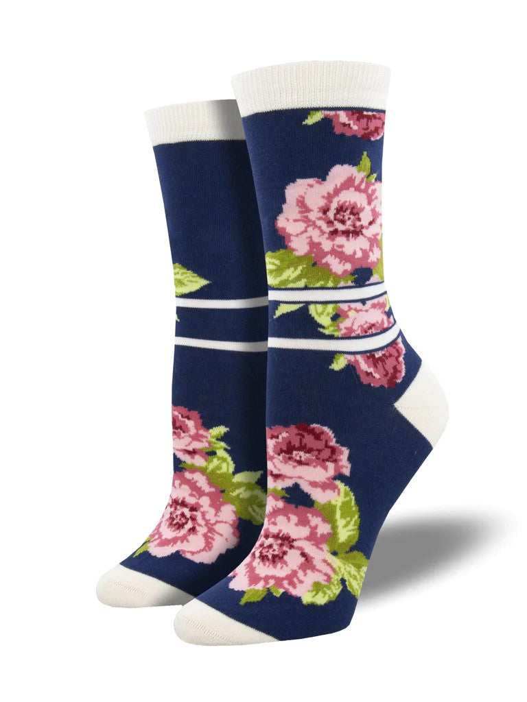 These pretty peony socks can dress up or down any outfit. Beautiful two-tone pink blooms pop against a midnight blue background, and are highlighted with a cool cream top, heel and toe, and stripes across the ankle. Made from naturally moisture-wicking bamboo fiber. Women's Shoe Size 6-10.5. Men's Shoe Size 5-9.
