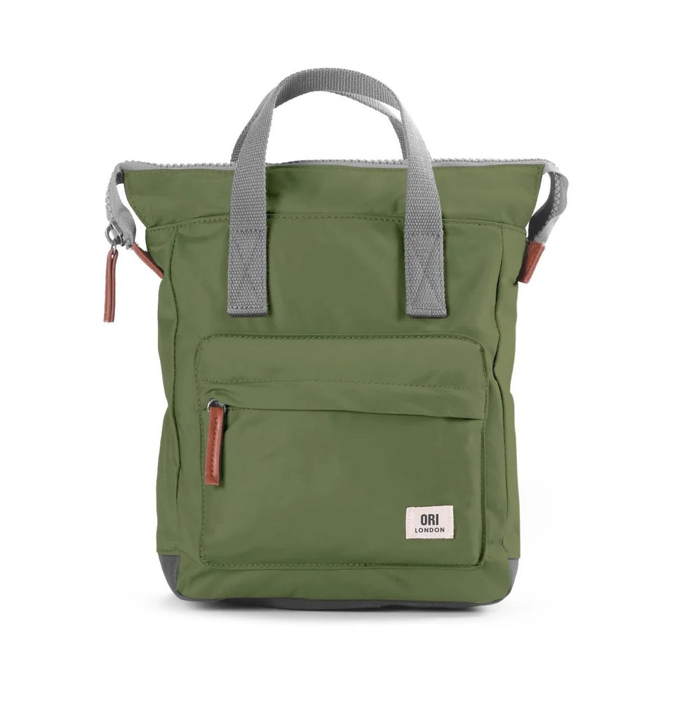 This versatile backpack can be carried comfortably on your back or by your side using the hand straps. It features a front pocket closed by a sturdy zip, a secure inside pocket, and a laptop/tablet sleeve inside. The heavyweight, durable recycled nylon material has a shiny look and a silky-smooth feel. 15.7" x 11.8" x 4.7". Vegan.