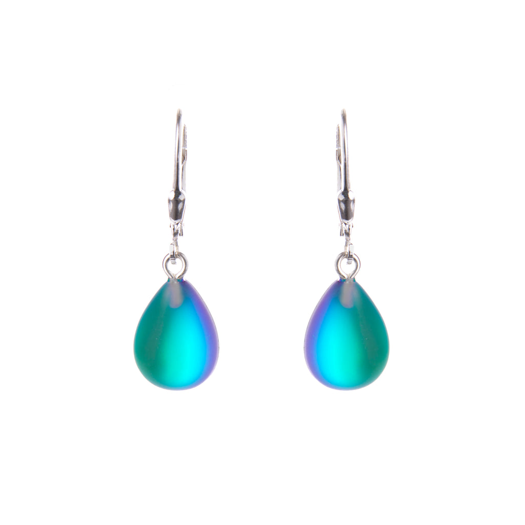 These unique hand-cut crystal droplet earrings change color depending on the light and skin tone, giving the wearer a unique, individual jewelry piece. Striking enough to wear for special occasions, durable enough to wear every day. Materials: sterling silver, hand-cut crystal. Dimensions: 1" x 0.4".