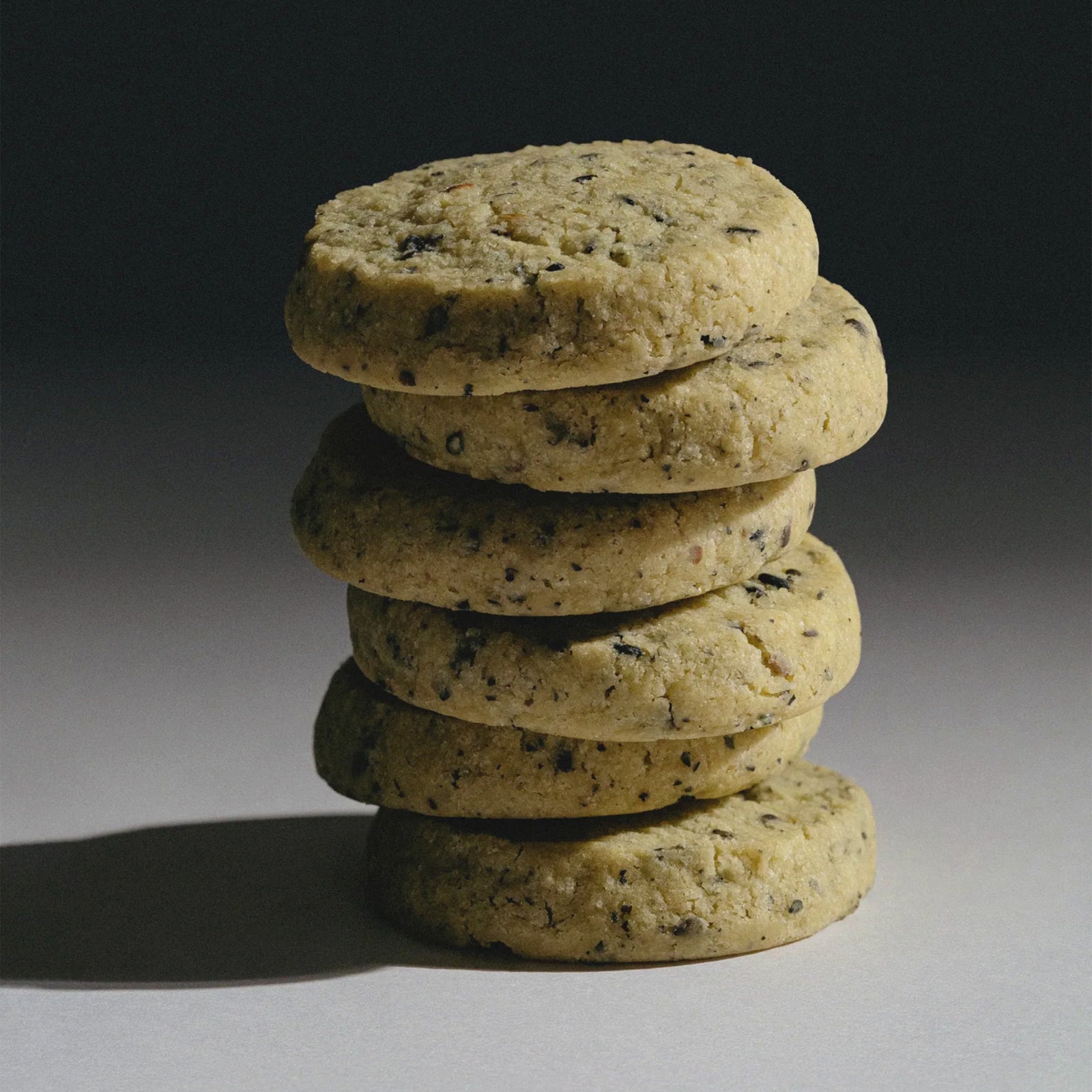 A package of Makabi & Sons UJI Shortbread Butter Cookies, featuring a cream-colored box with a vintage illustration of a flying crane and gold and gray text.