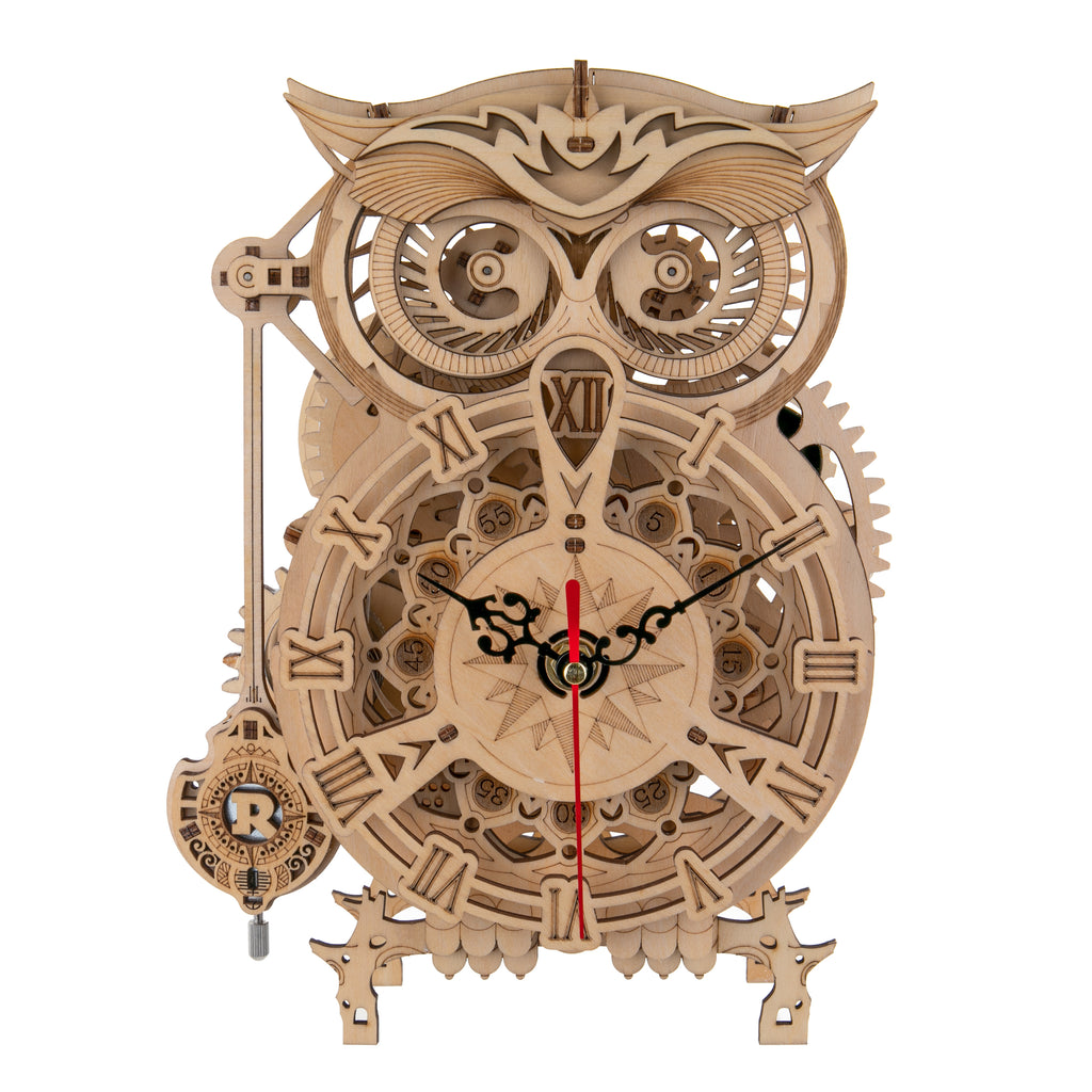 Turn 2D pieces into a 3D masterpiece! This exceptional natural wood kit makes a mechanical Owl Clock which is both a work of art and a great conversation starter. Features a swinging pendulum, functioning clock, and even a ringing timer.  Recommended for ages 14+ Assembled size: 8.11 x 5.04 x 10.43 inches. 161 pcs.