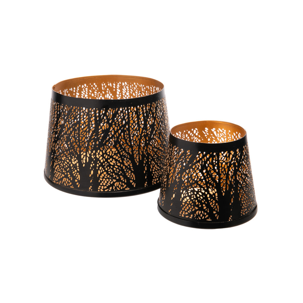 Add a serene ambiance to your home with this Tapered Punched Metal Candle Holder set. The quality metal composition is sure to last for seasons to come.