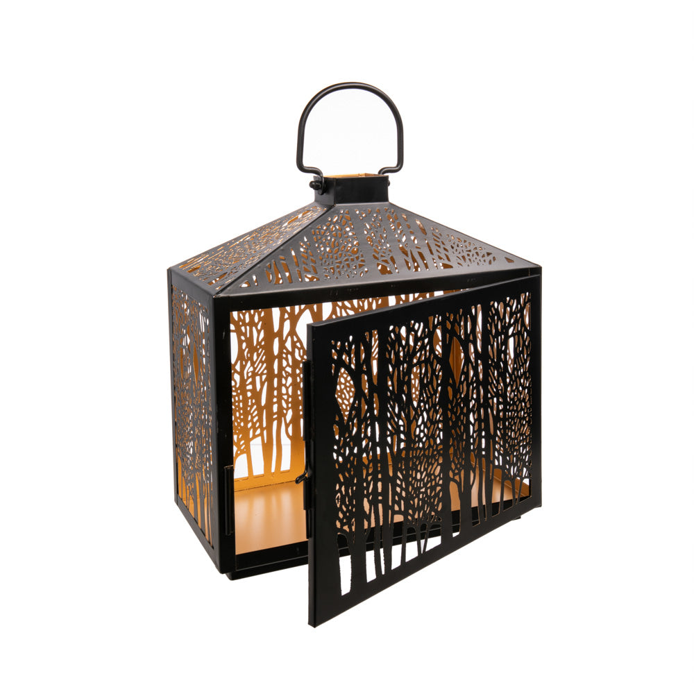 Beautify your home with this stunning Forest Cut Metal Lantern. This piece will surely add an elegant and contemporary touch of style to your living space.