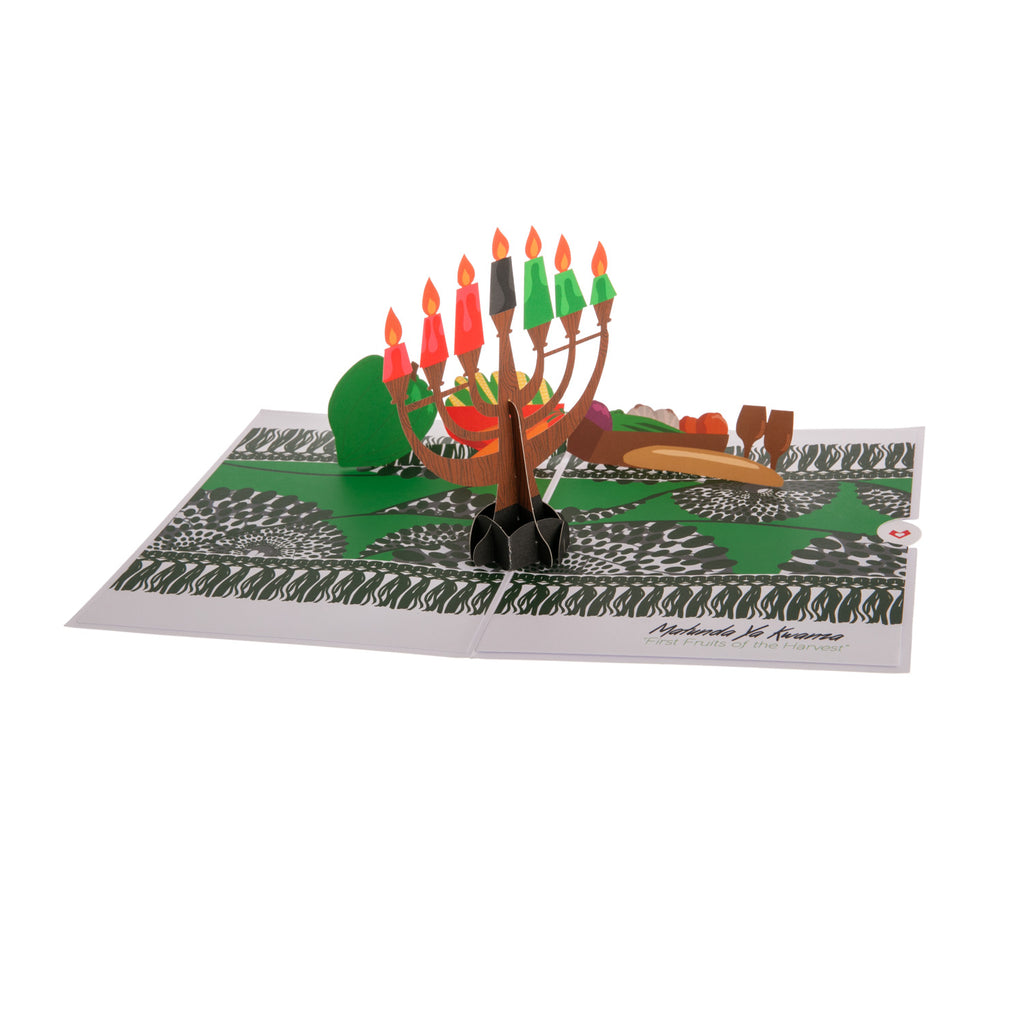 This beautiful card celebrating Kwanzaa opens to display a traditional kinara candle set. With a beautifully simple yet elegant front, the 3D paper pop-up in the interior will dazzle your loved one! 5" x 7" Includes envelope, pop-up card, and blank note FSC-certified craft paper