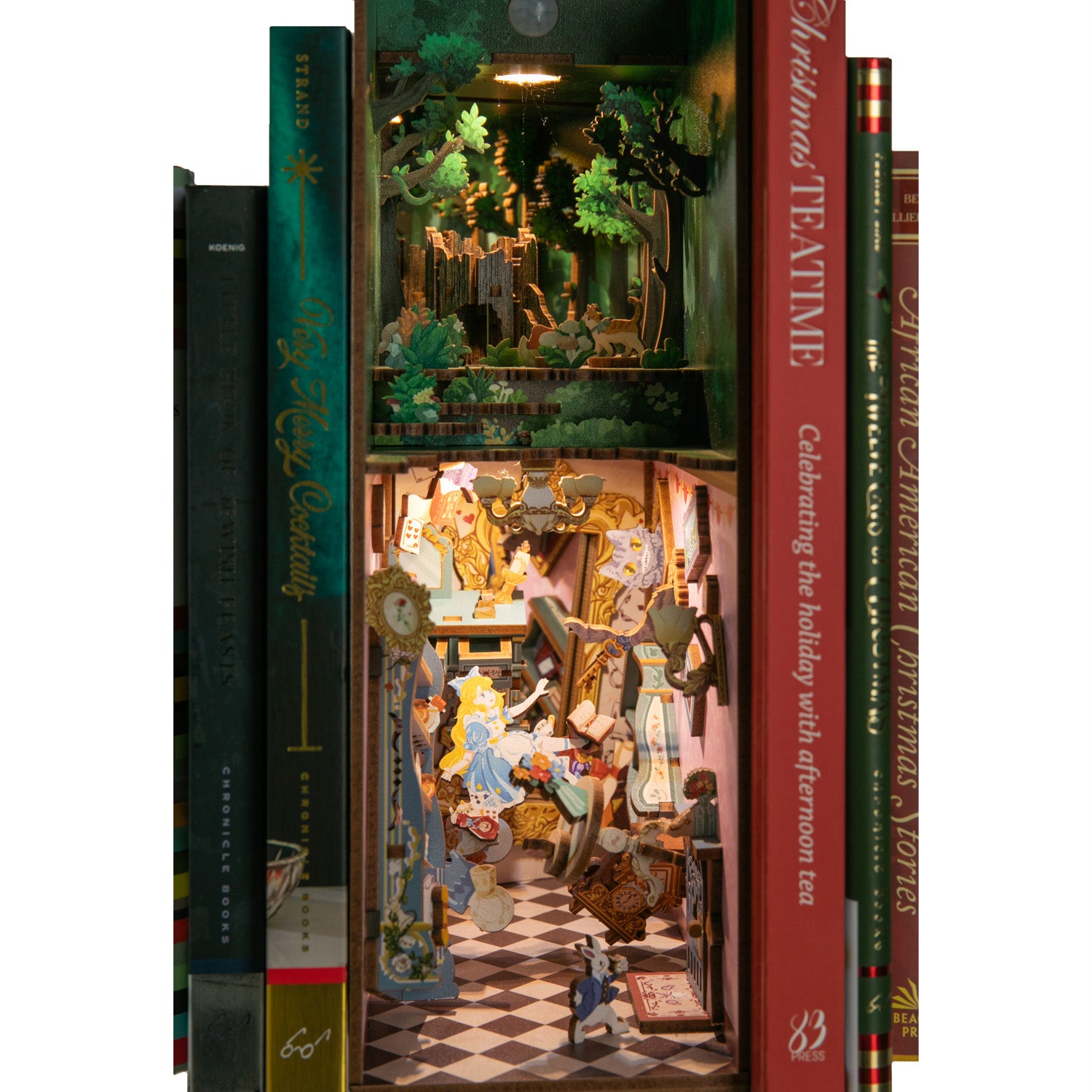 This exquisitely designed book-nook kit transports you straight into the whimsical world of Wonderland. Its color palette, reminiscent of Lewis Carroll's vivid imagination, paints a fantastical landscape that mirrors the story's enchanting charm. 3.15 x 7 x 9.6". Wood, plastic, metal LED lights. 184 pieces.