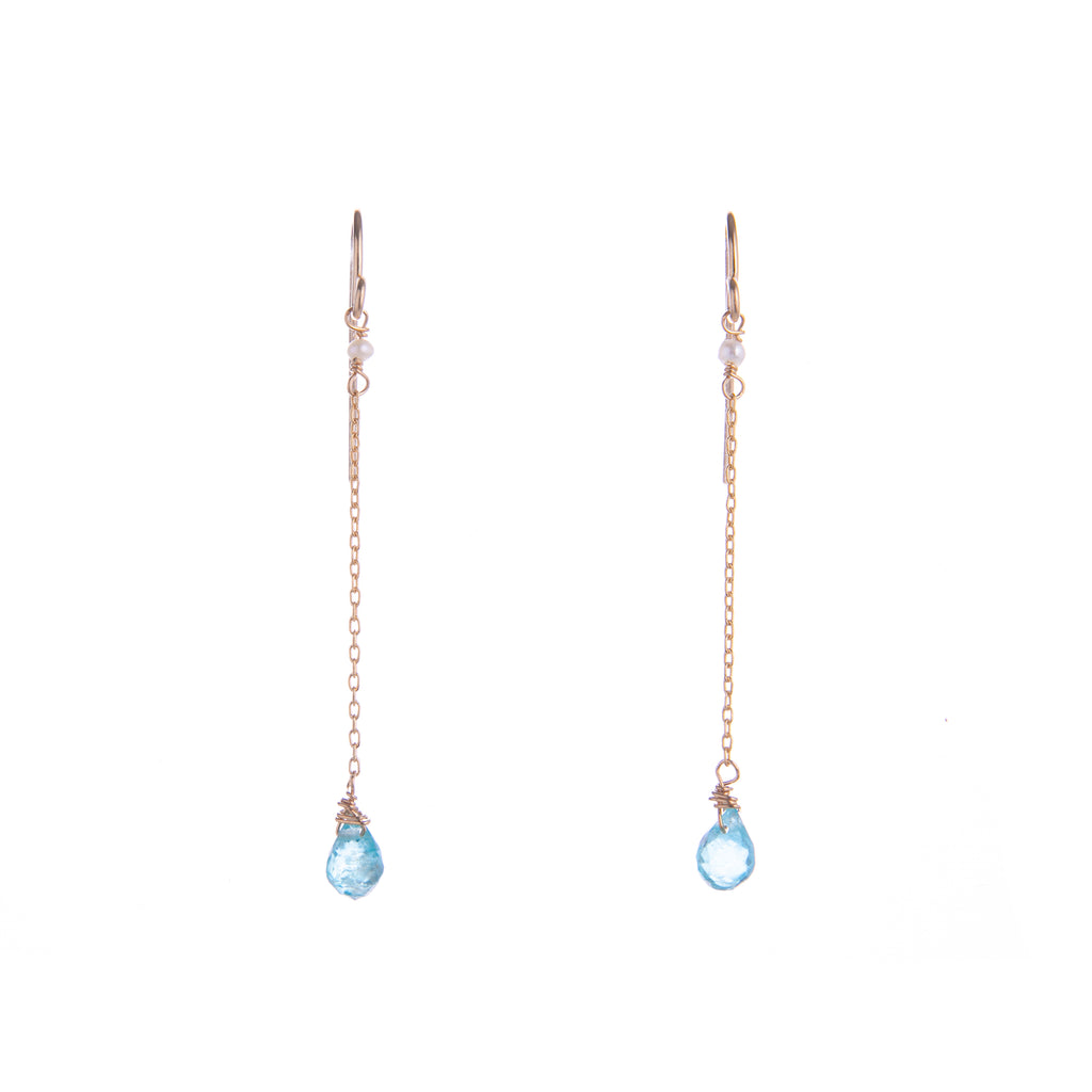 Apatite is said to be good for self-confidence and embracing your true self. Wear these Blue Apatite dangle earrings to add confidence and subtle glam to any look. With crystal pearl detail and gold fill chain, these earrings will look great day or night. Dimensions: 1.5" Length from hook Material: 14ct Gold Fill