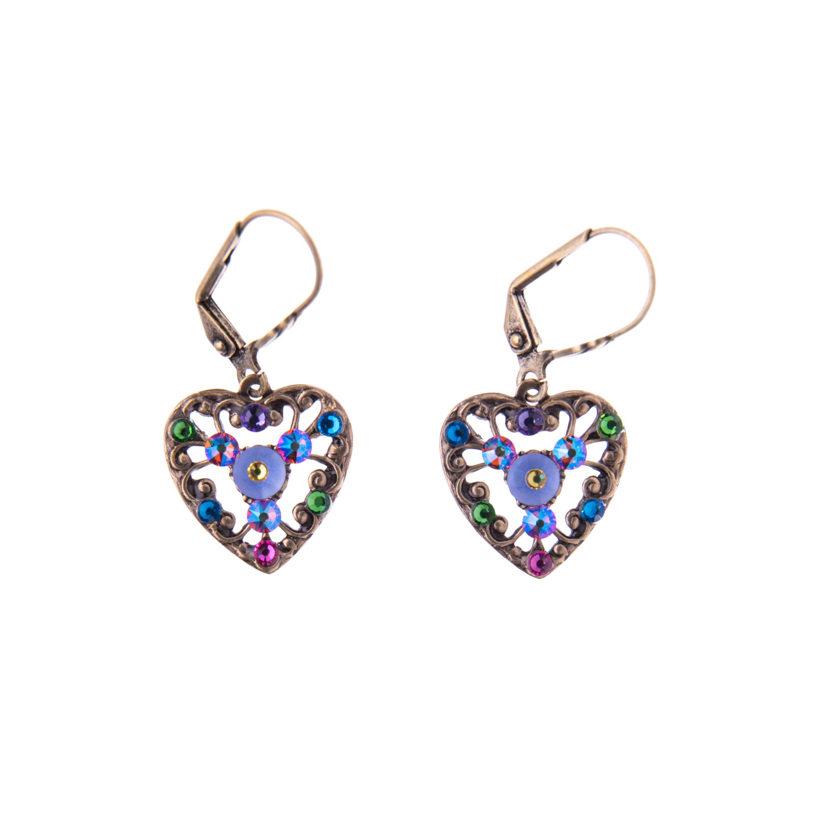 These filigree heart earrings adorned with multicolor crystals are completely romantic and give enough sparkle for a night out. Perfect for Valentine's Day, an evening at the ball, or to add some shimmer to your outfit. Dimensions: 1.5" L x 0.75" W Material: Antiqued brass, crystals Nickel free Handmade in USA