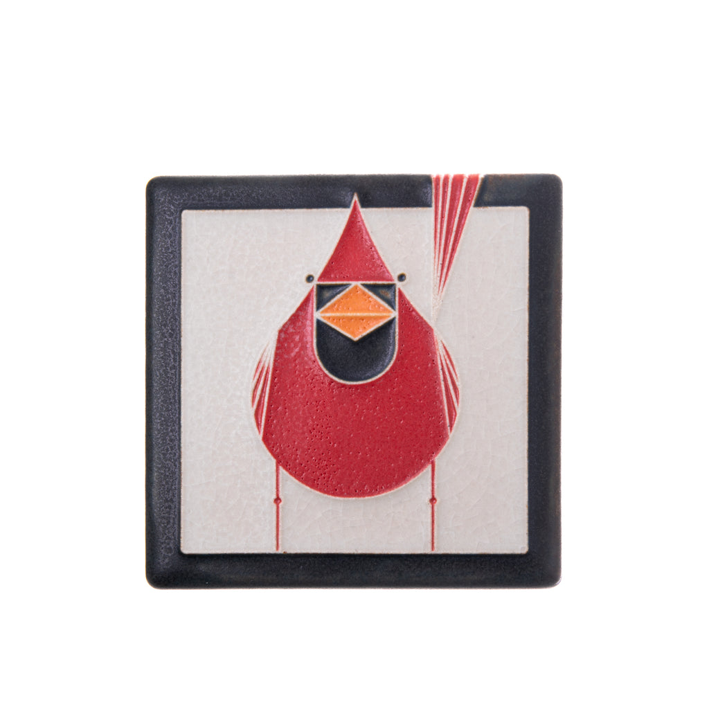 With this striking cardinal, mid-century modern meets Motawi mastery in these tiles based on the work of artist Charley Harper. From the Harper print "Red and Fed". Actual Size: Approximately 3 7/8” x 3 7/8”. Dimensions may vary. Tiles are 5/8" thick and have a notch for hanging. Handmade in Ann Arbor, Michigan