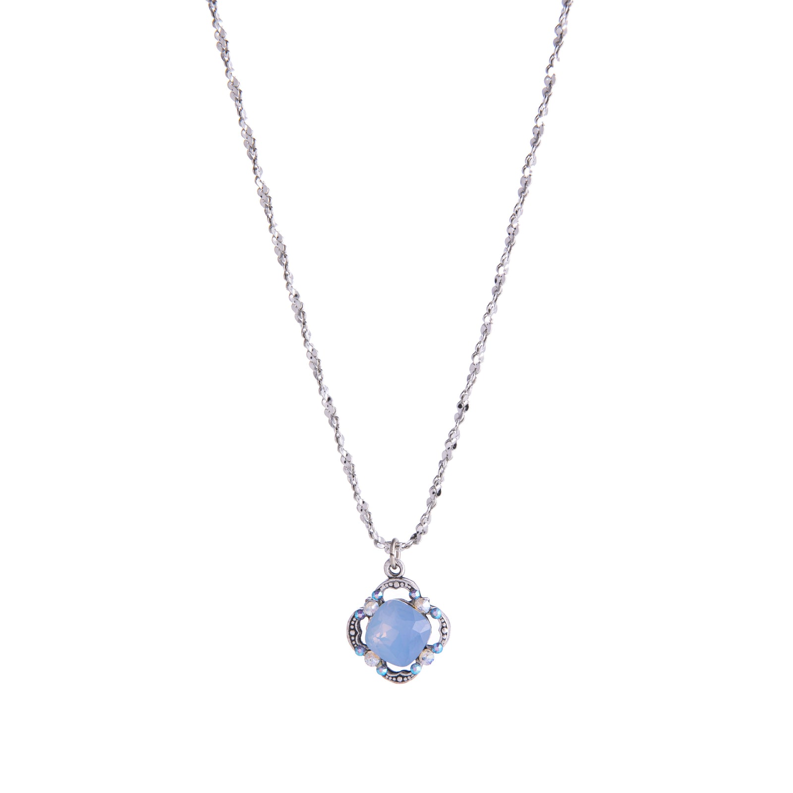 This Air Blue Opal necklace has vintage flair. With crystal detail and sterling silver plating, this necklace evokes soft glamour and an antique look. 