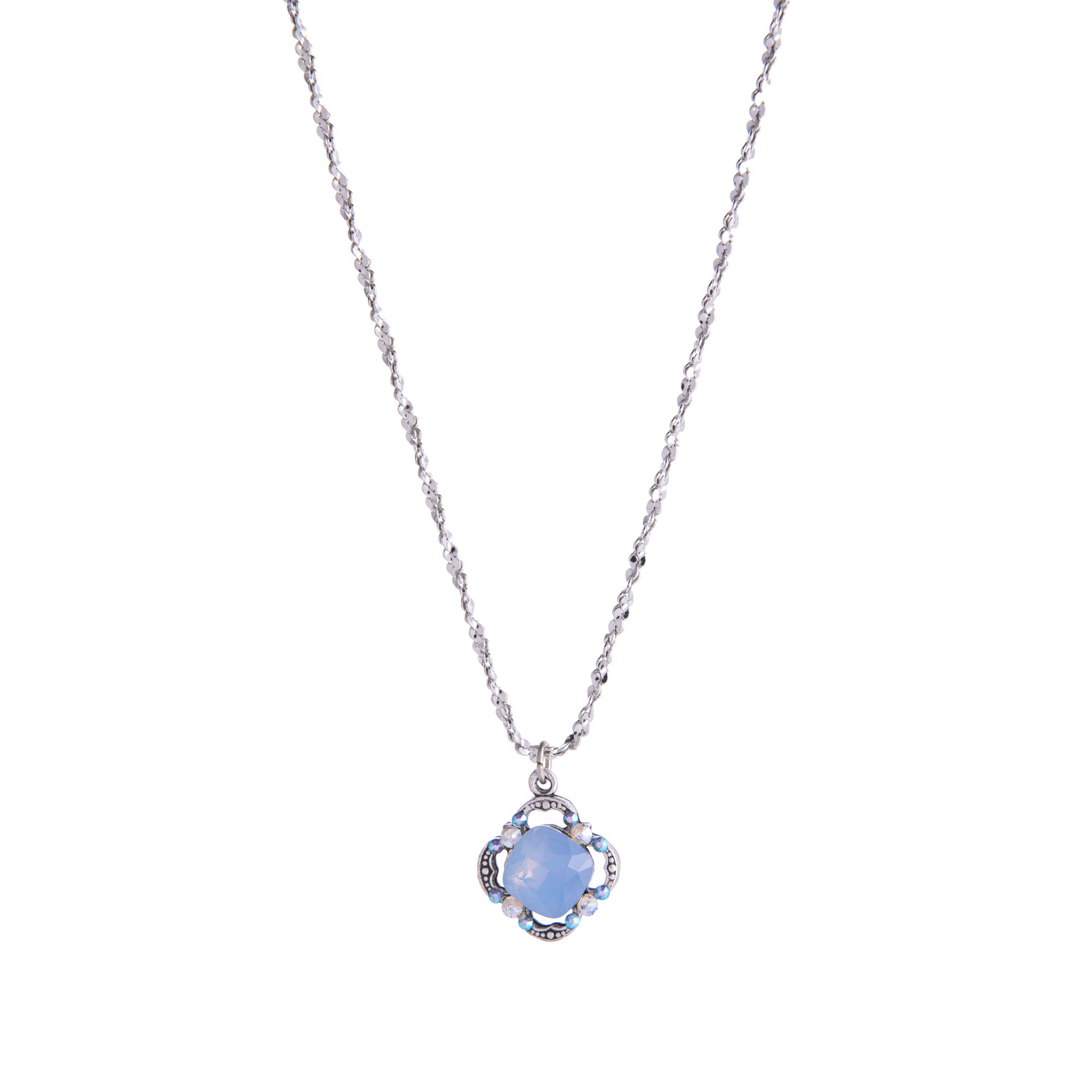 This Air Blue Opal necklace has vintage flair. With crystal detail and sterling silver plating, this necklace evokes soft glamour and an antique look. 