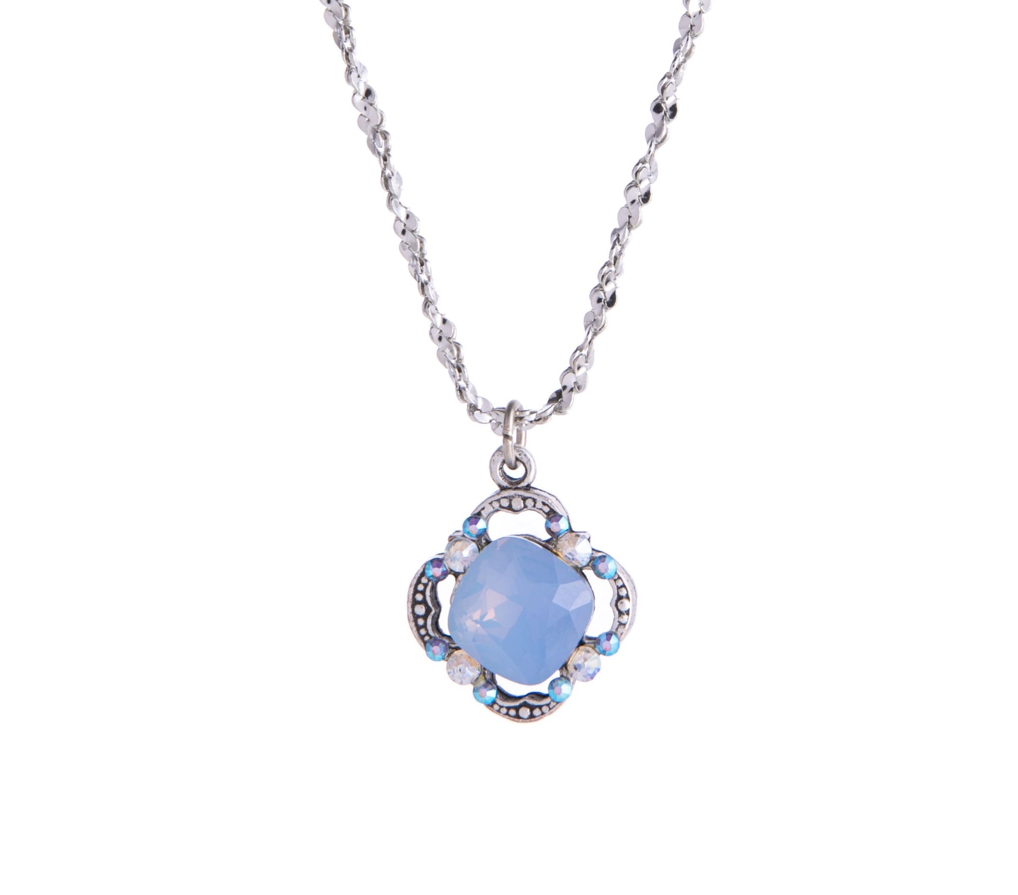 This Air Blue Opal necklace has vintage flair. With crystal detail and sterling silver plating, this necklace evokes soft glamour and an antique look. 
