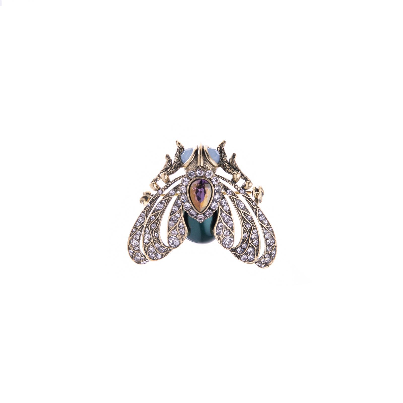 A gold-plated brass brooch in the shape of a moth with crystal details and a synthetic pearl center.