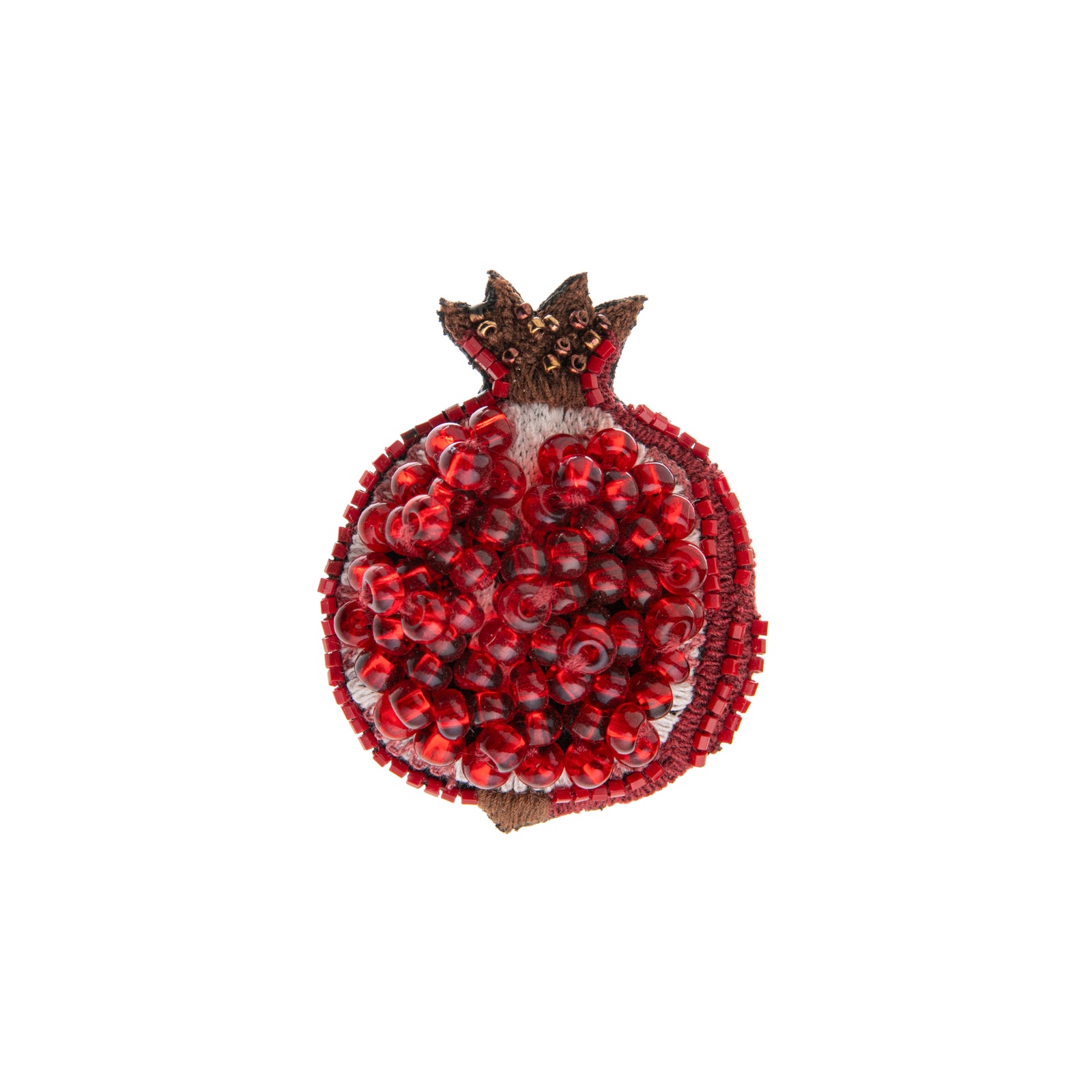 This pomegranate pin with intricately hand-made embroidered beads has a base of cotton and felt. Add this pin to any outfit for a pop of color. 
