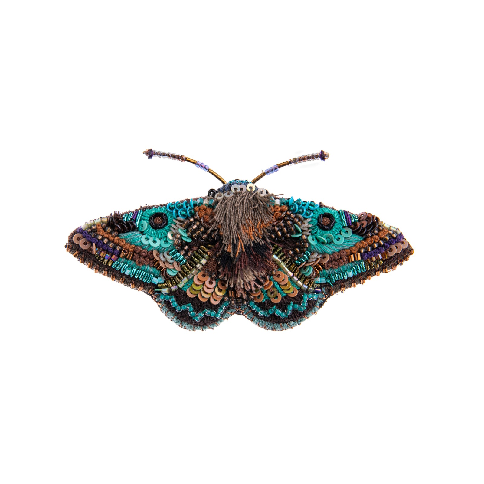 The Lanipes moth pin is intricately hand-beaded and is embroidered on a base of cotton and felt. Add this moth pin to your look to celebrate this mystical bug. 