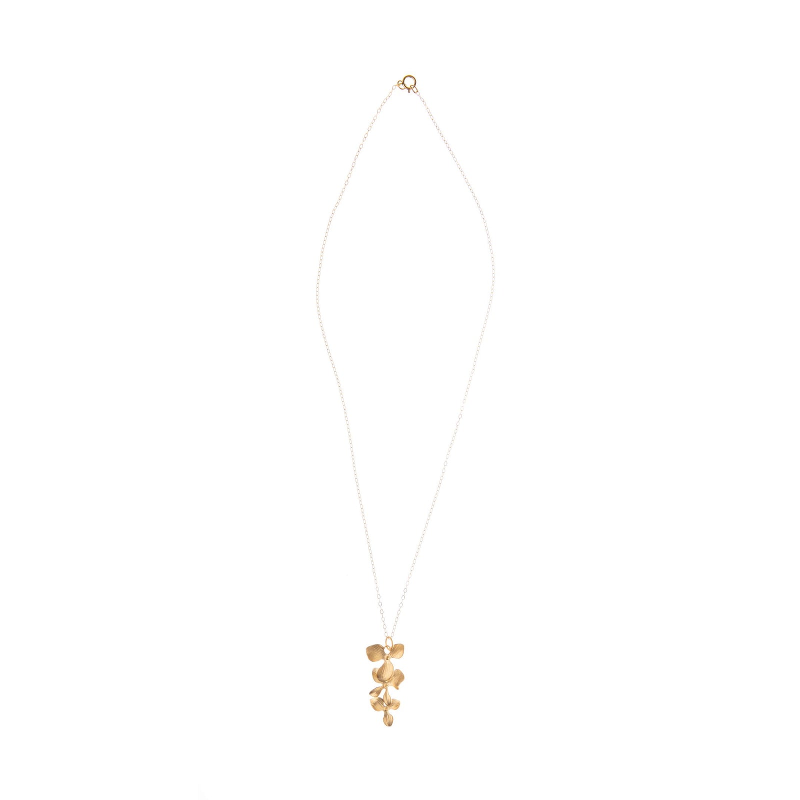 This elegant, stylish, and charming gold-dipped necklace features an organic construction and feminine floral details. Bring the beauty of our gardens with you wherever you go with this beautiful, unique necklace. 14k gold-filled chain 16k matte gold–dipped, carved orchid cascading drop detail.