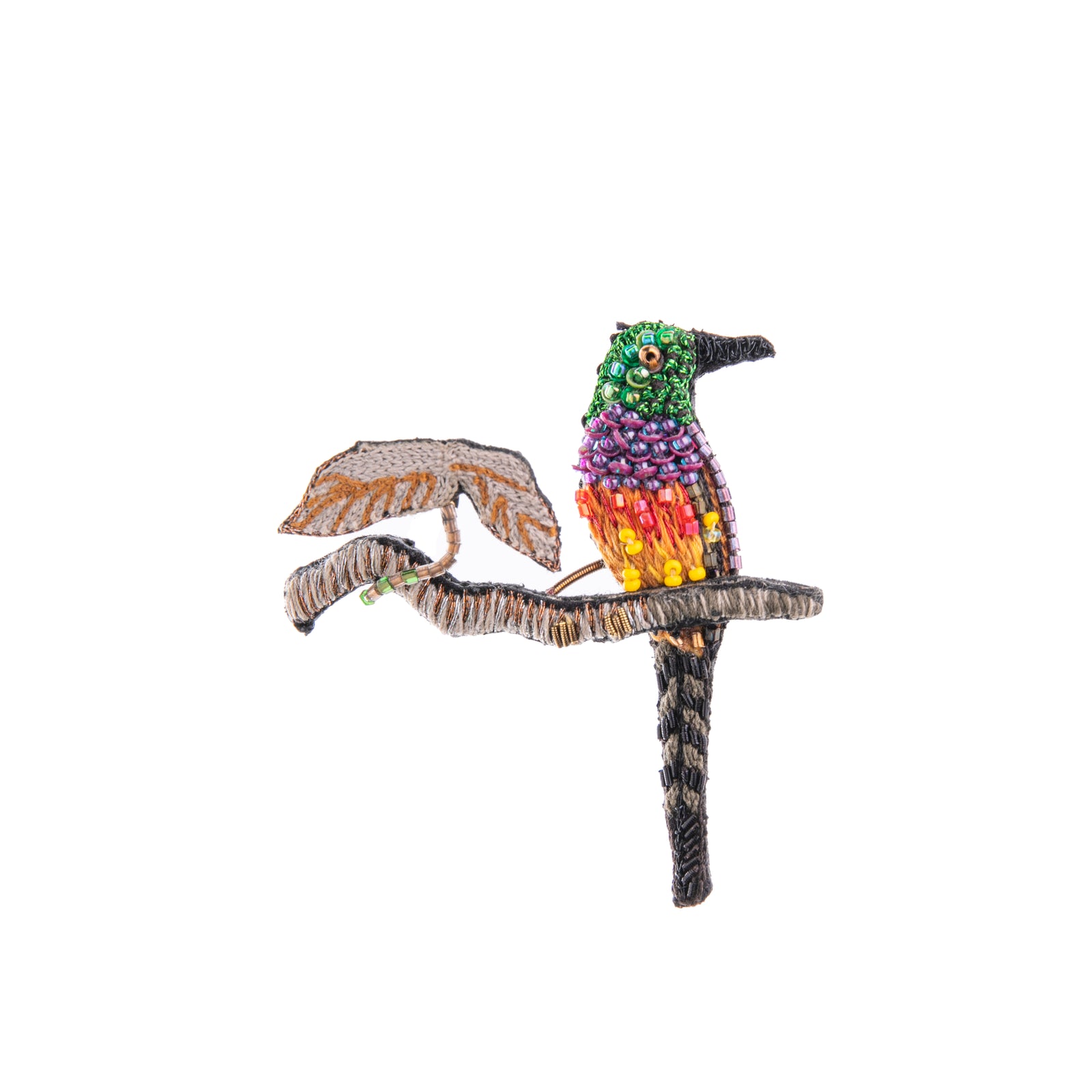 Celebrate the vibrant Green Tailed Sunbird with this hand-beaded pin, embroidered on a base of cotton and felt. This pin would be a perfect pop of color. 