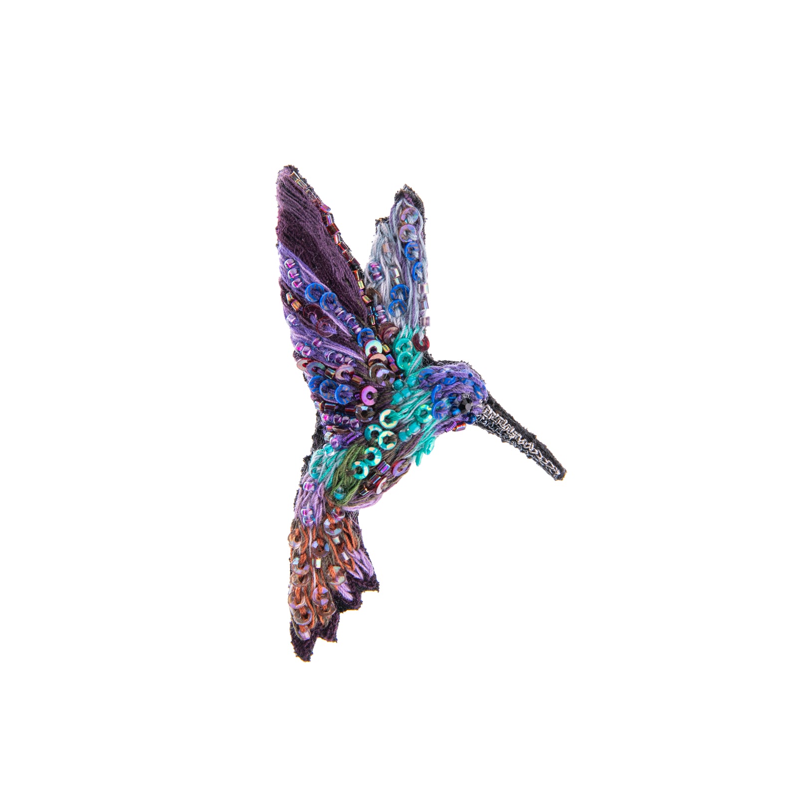 This precious pin is hand-beaded and embroidered on a base of cotton and felt. Featuring jewel tones, this hummingbird would look wonderful on any outfit. 