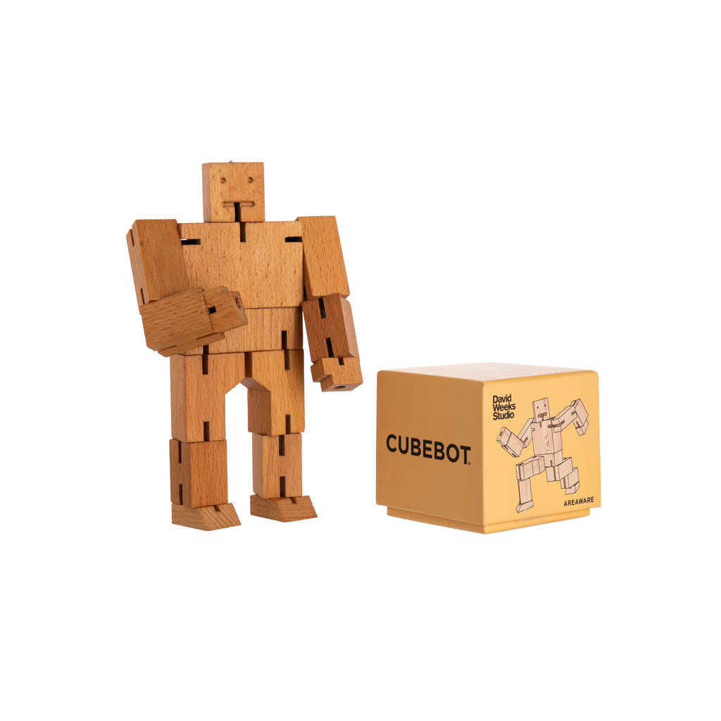 Cubebot® is a wooden toy robot inspired by Japanese Shinto Kumi-ki puzzles. Made from wood and elastic, Cubebot can be positioned to hold dozens of poses. When it’s time to rest, Cubebot folds back into a perfect cube. A classic toy for all ages. Dimensions: 2.5" x 2.5" cube; 6.75" tall x 9.25" arm span.