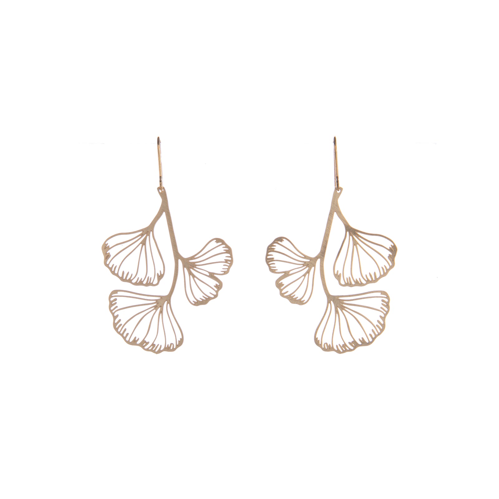 The stunning fan-shaped ginkgo leaves are celebrated in these gold-plated dangle earrings. These ginkgo earrings would look stunning as an addition to any outfit. Pair with your other gold jewelry or wear on their own for the ultimate ginkgo glamour. Dimensions: 2" L x 1.25" W Material: Gold-plated brass 