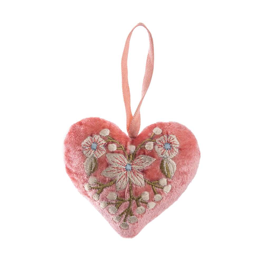 This beautifully luxurious 'Liza' heart ornament is made from light sorbet pink 100% silk velvet which is then sumptuously padded and embroidered with delicate blossoming flowers. It is finished off with a silk-satin ribbon loop for easy hanging. Created by Anke Drechsel, a German textile designer.  3.25" x 2.5".