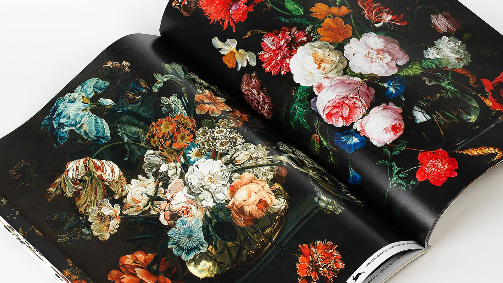 If you are in need of gift wrap, this book of gift paper has floral and natural still life. This collection of works have been turned into creative gift paper. Can be used for wrapping or for your creative process.  12 sheets of gift paper Dimensions of book: 10" x 13.5" Dimensions of paper when unfolded: 19.5" x 27.5"