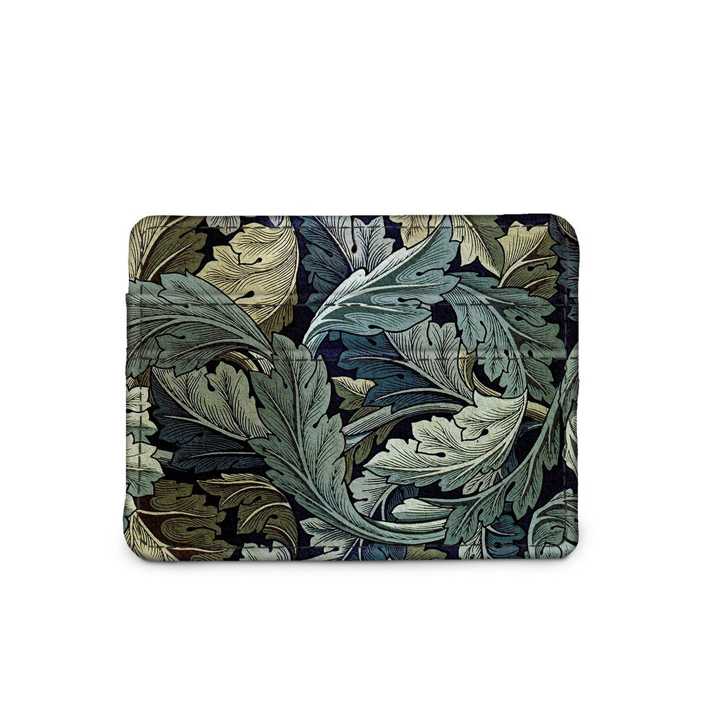 Celebrate William Morris with this slim wallet decorated with William Morris' Acanthus (1875). This wallet offers four exterior slots with a center pocket. The RFID blocking technology will protect against identity theft. Dimensions: 4" x 3" x 0.25" 4 exterior card slots Central card slot Material: Vegan Leather