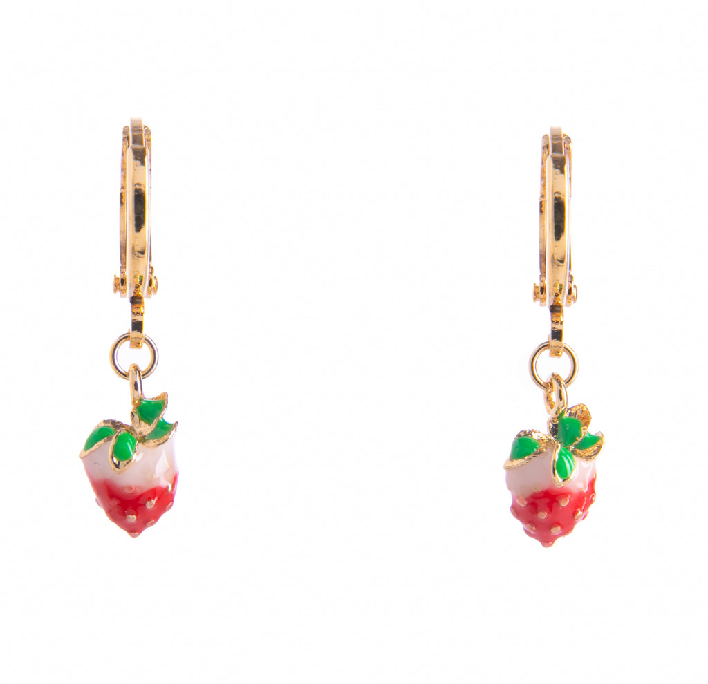 A delicate pair of gold huggie hoop earrings featuring dangling red strawberry charms, made from enamel. Designed with a simple click-in-place fastening, these adorable earrings are ideal for wearing every day to bring color and fun to an outfit. Materials: 14ct gold plated brass, enamel. 1" x 0.25".