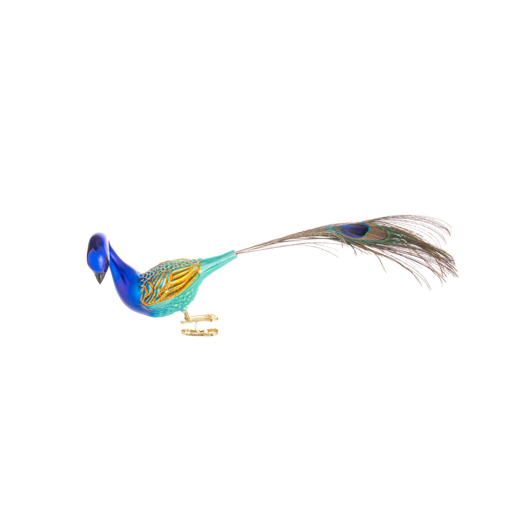 The peacock symbolizes beauty, prosperity, and compassion. Get this hand-made glass peacock ornament to harness the power of those values this holiday season.