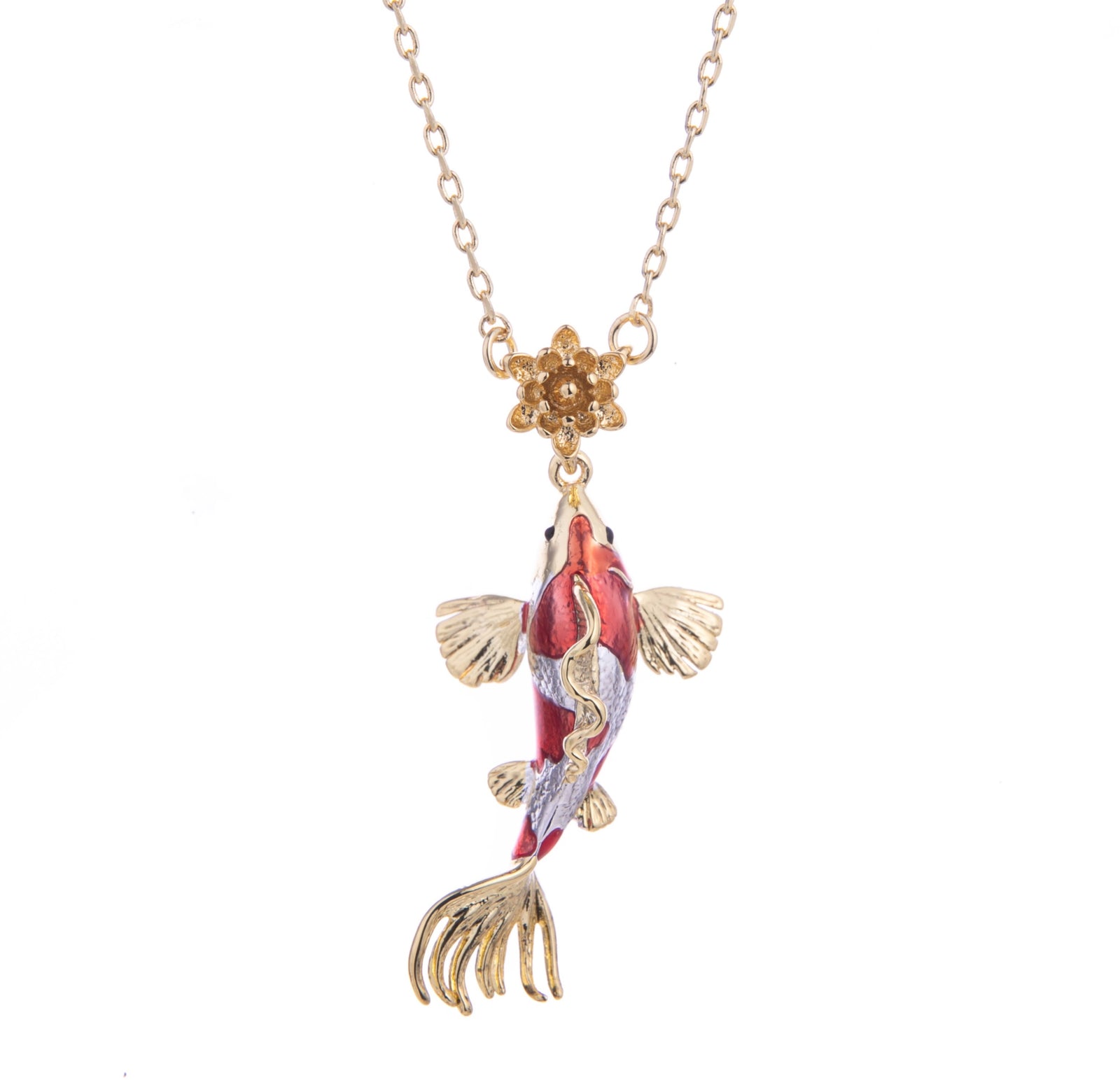 In Japan, koi fish have come to be symbols of love and friendship. With a golden lily pad, this koi fish necklace is perfect to wear to an event. The gold plating and chain and vibrant red enamel makes the necklace incredibly elegant. Dimensions: Approx. 15.7" Chain Length, Material: Gold-plated Brass, Enamel 