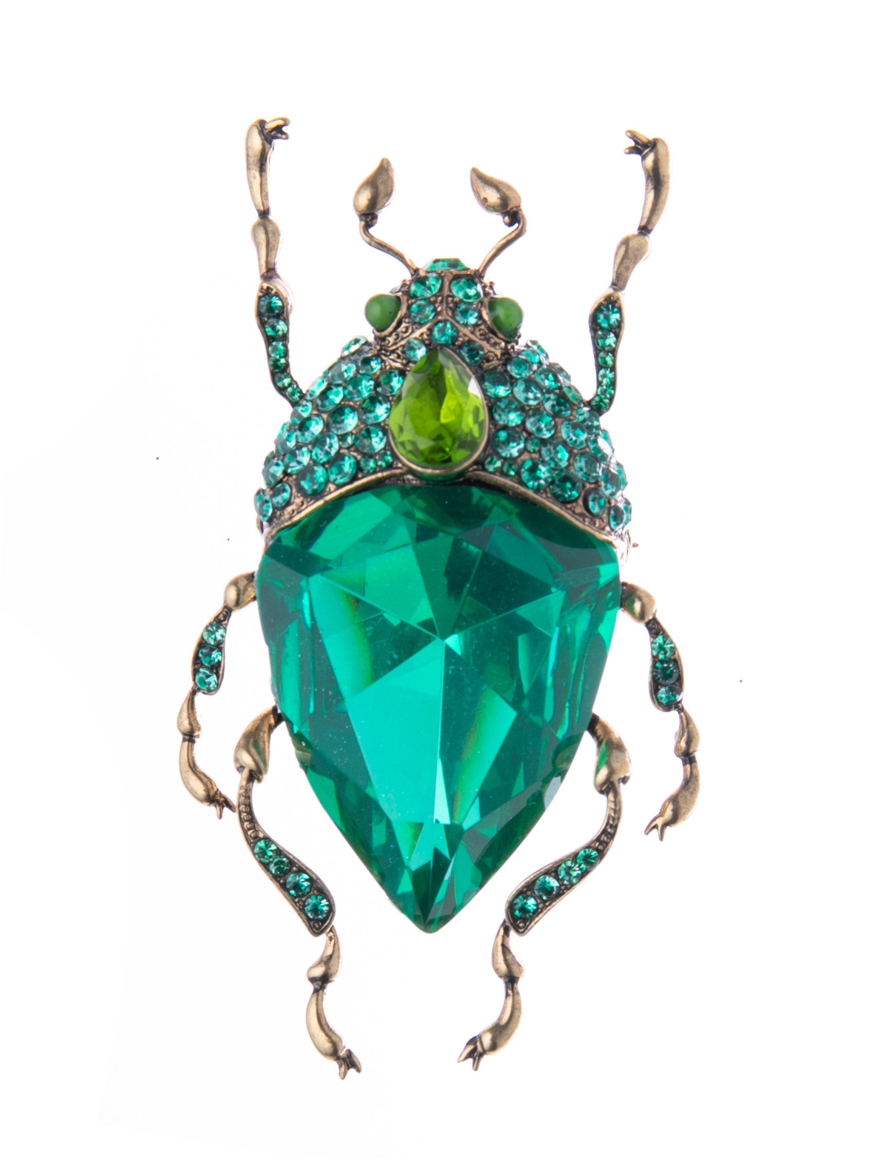 If the Emerald City had bugs, they would look like this! This green bug brooch has a multi-faceted green glass body and crystal encrusted legs and head, all on an antique gold base. Wear on a solid color outfit for a pop of interest and sparkle. Brass with antique gold plating, glass, crystal. Dimensions: 2.25" x1.5".