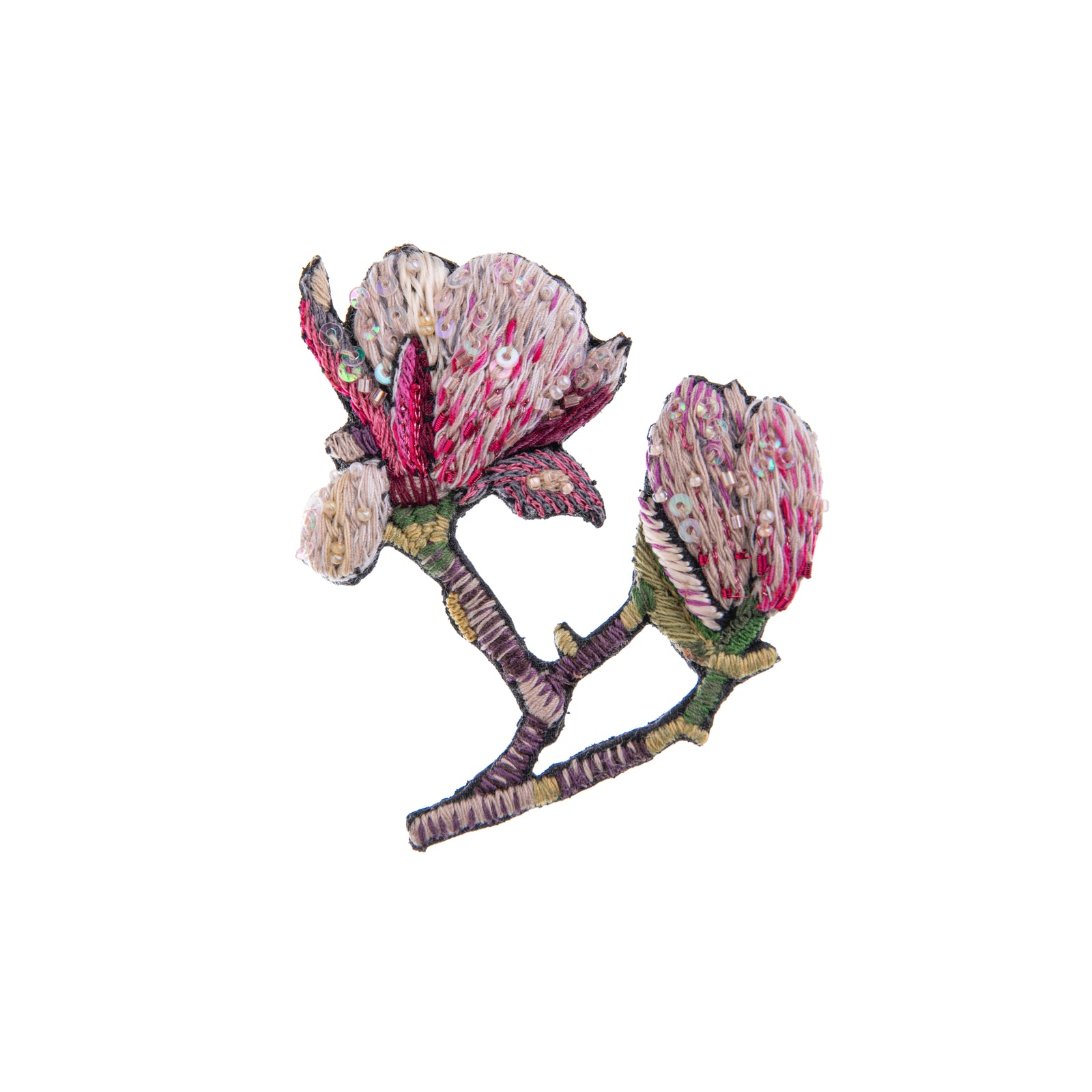 Celebrate pure beauty with this magnolia pin. This pin is intricately hand-made with embroidered beads and features a magnolia of pink, green, and white. 