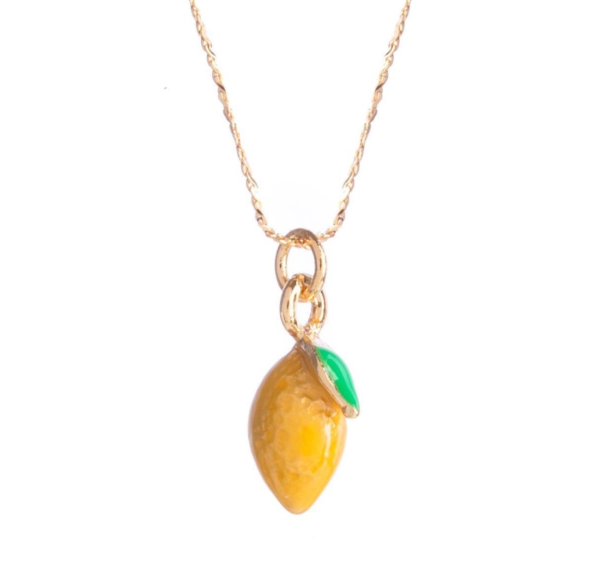 Add a fruity twist to a simple outfit with this adorable lemon pendant necklace. Made from 14ct gold plated brass, the super thin trace chain holds a dainty yellow and green enamel charm in the shape of a lemon. Materials: 14ct gold plated brass, enamel. Dimensions: Chain length - up to 18". Lemon charm: 0.25" x 0.25".
