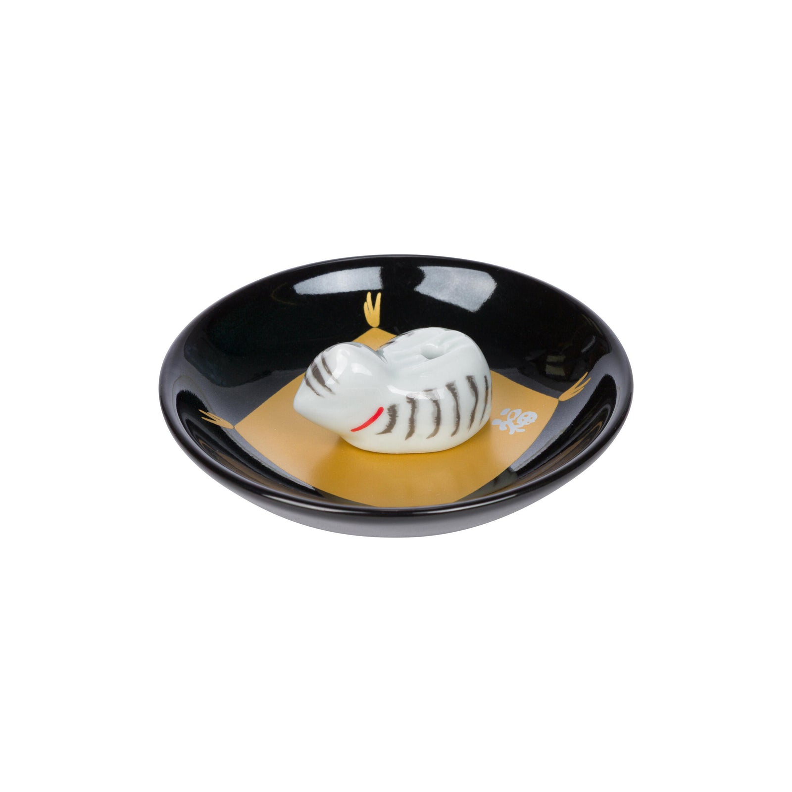 Black ceramic dish incense holder with a white cat-shaped object on a white background