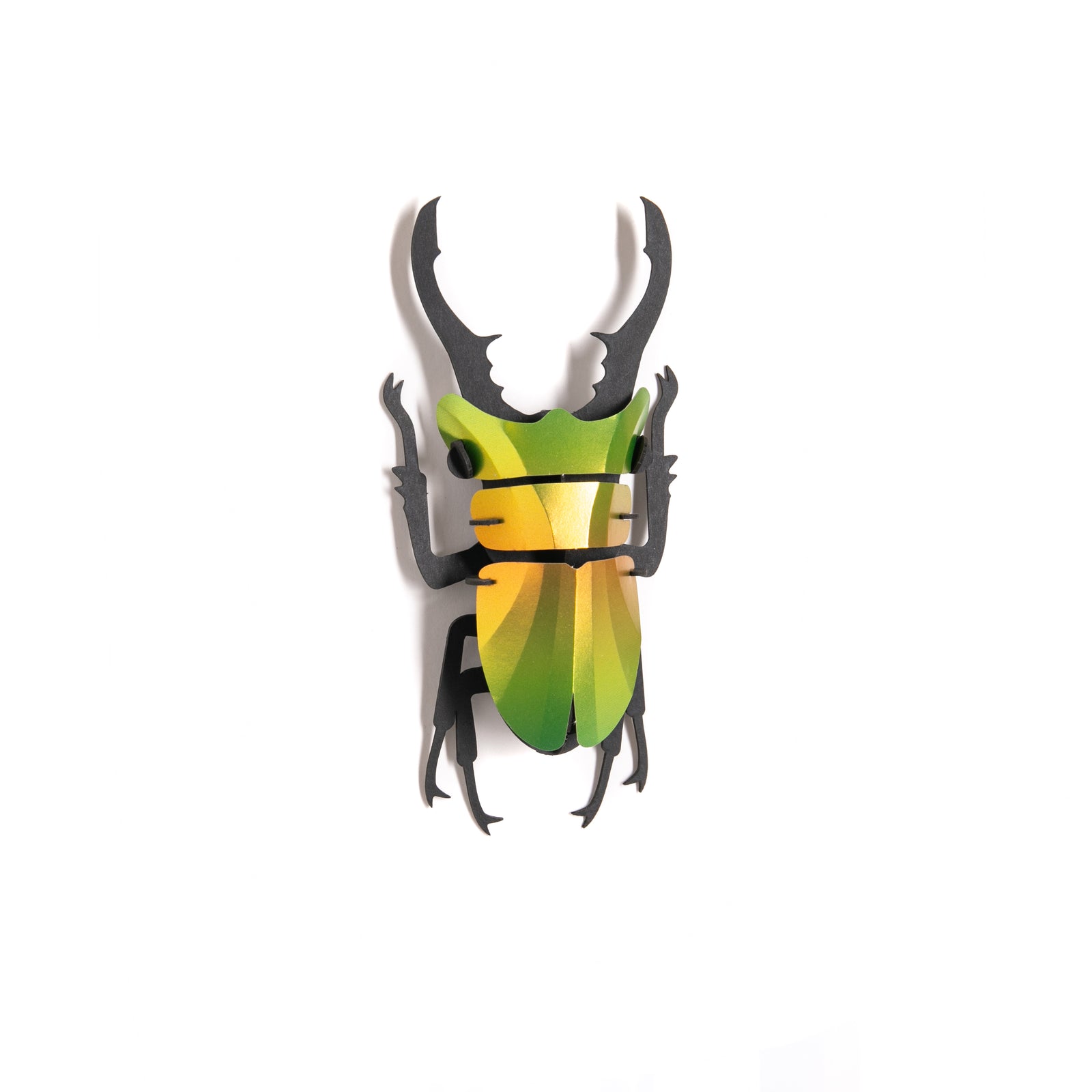 Create an eye-catching decor piece with this 3D green stag beetle. The vibrant colors and satin metallic finish of this stag beetle perfectly mimic the insect’s natural, light-catching luster. Building this stag beetle is a great indoor activity for all ages. Dimensions: 5.5" x 2.5".