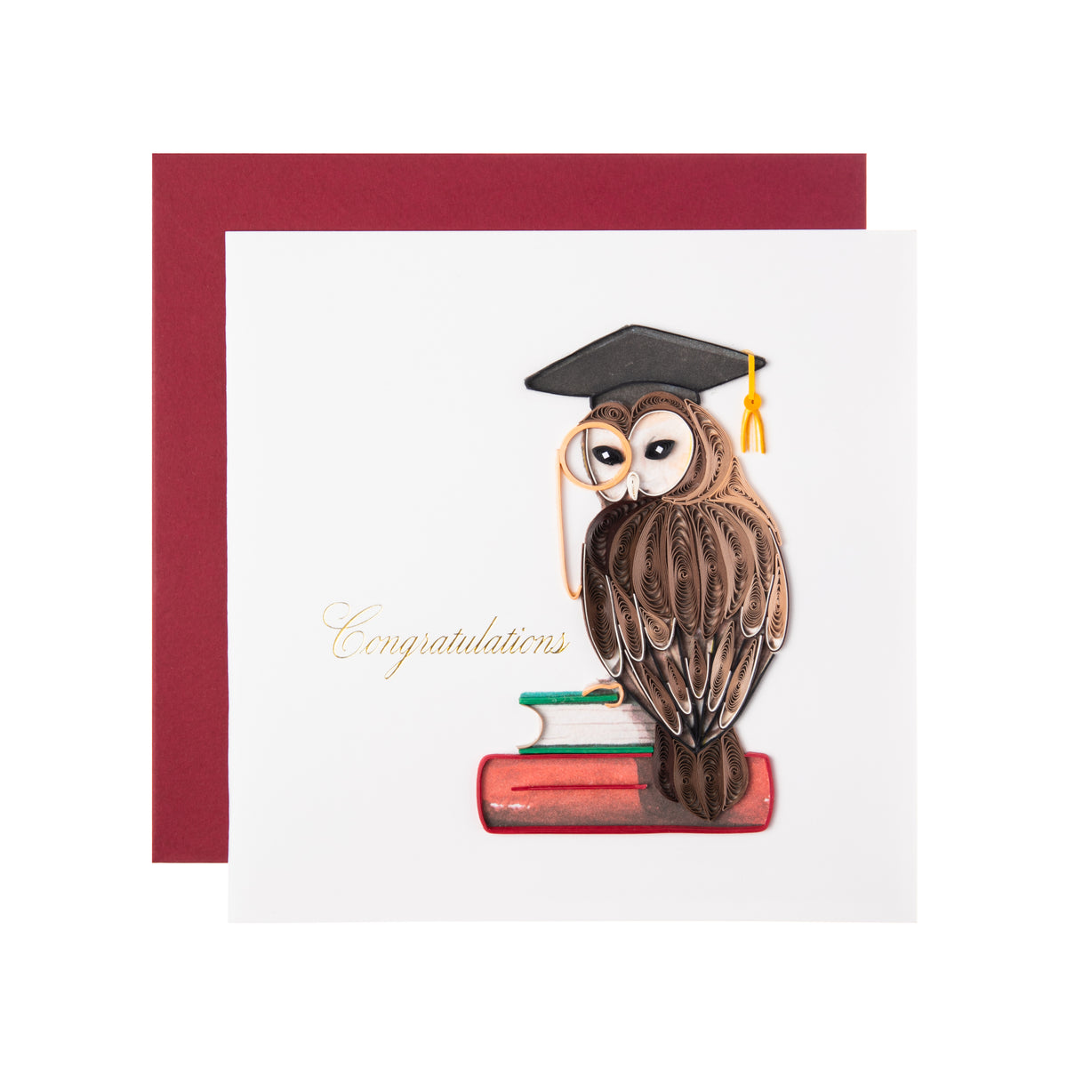 Congratulate your new graduate with our quilled owl card. With a graduation cap and tassel, this owl is perched on a stack of books and ready to share its knowledge. Each quilled card is handmade by a highly skilled artisan and takes one hour to create. Outside copy: “Congratulations” Inside copy: blank. Size: 6&quot; x 6&quot;.