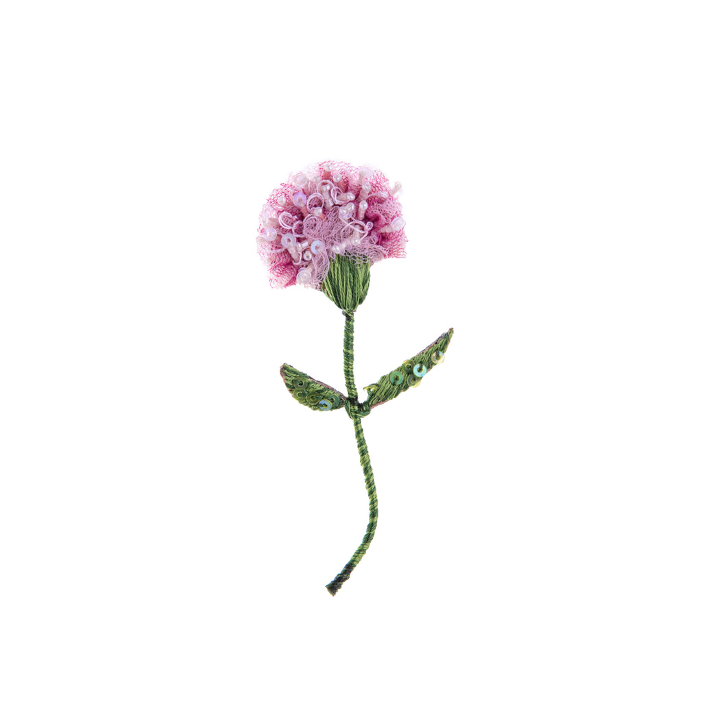 This intricately hand-beaded pink carnation pin is embroidered on a base of cotton and felt and would add a beautifully botanical touch to any look. 