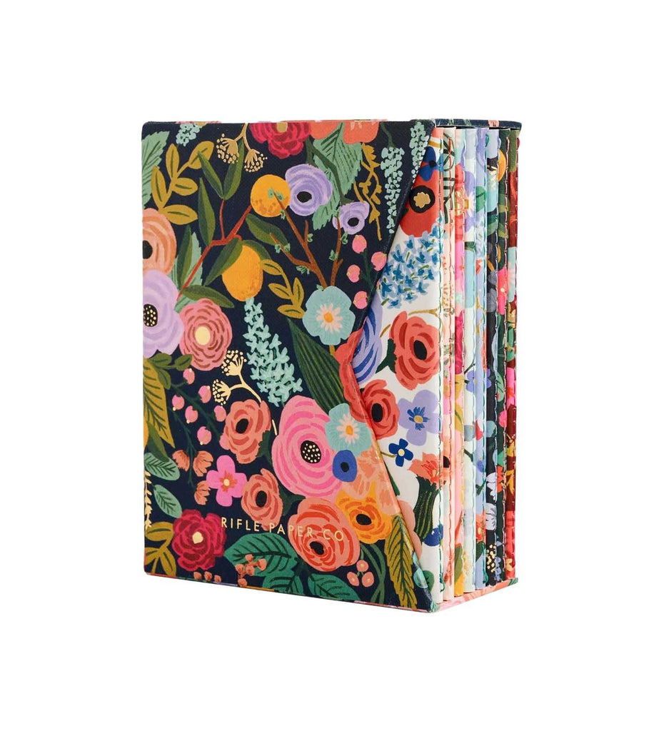 This set of 8 garden party-themed notebooks are perfect for your writing or stationery set. These pocket-sized notebooks are also thin enough to carry with you in your purse or work bag. Dimensions: 5.5" × 4.25" Colored lines on interior pages Contrast color thread-stitched binding 40 ruled pages per notebook