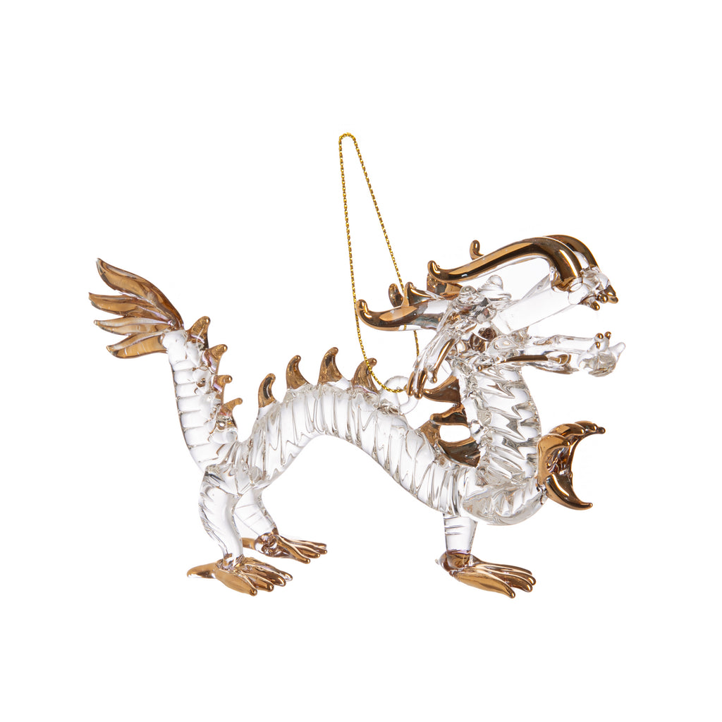 Add a touch of elegance and luxury to your Lunar New Year decor with this hand-blown glass dragon figurine.  The dragons' feet, mane and claws are opulently highlighted with gold-leaf paint, creating a stunning ornament which can either be placed on a shelf or tabletop, or hung on a tree. Dimensions: 6" x 4".
