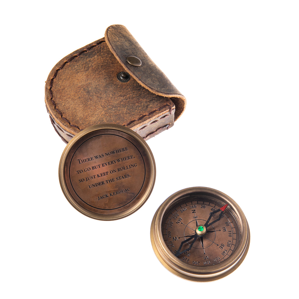 This vintage style compass features a twist-off lid which is inscribed inside with a quote from Kerouac's most famous work, On the Road. The quote reads; "There was nowhere to go but everywhere, so just keep on rolling, under the stars". Metal compass with leather carrying pouch Compass diameter: 2.25".