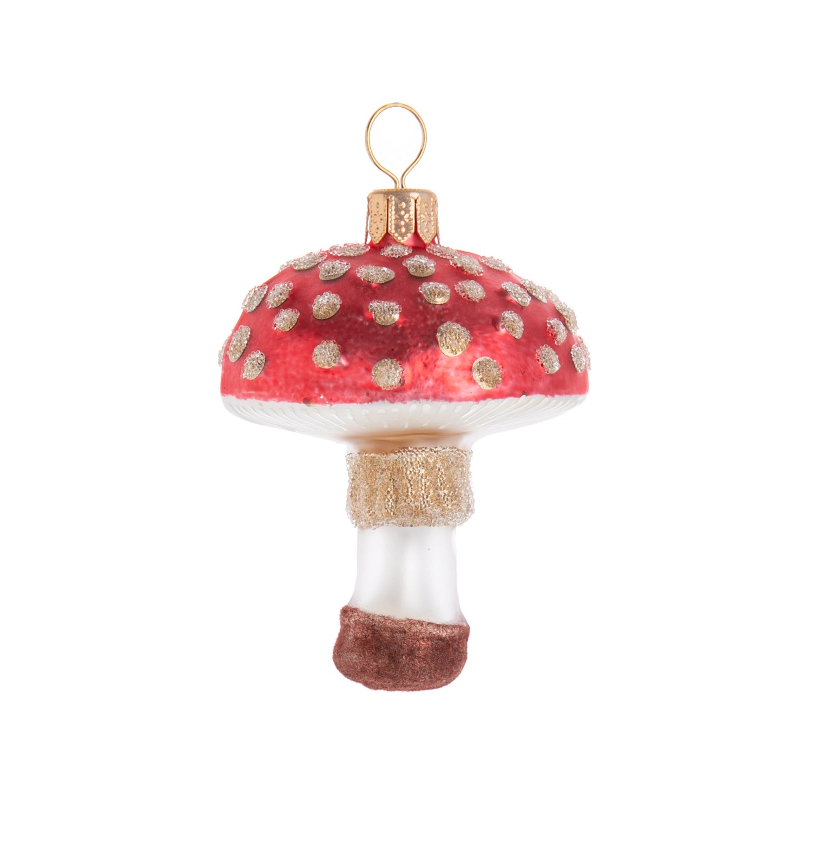 Add some woodland enchantment to your holiday decor with this enchanted mushroom ornament. Crafted in glass and hand-painted and glittered. Hand crafted glass ornament Dimensions: 3.25" x 2".