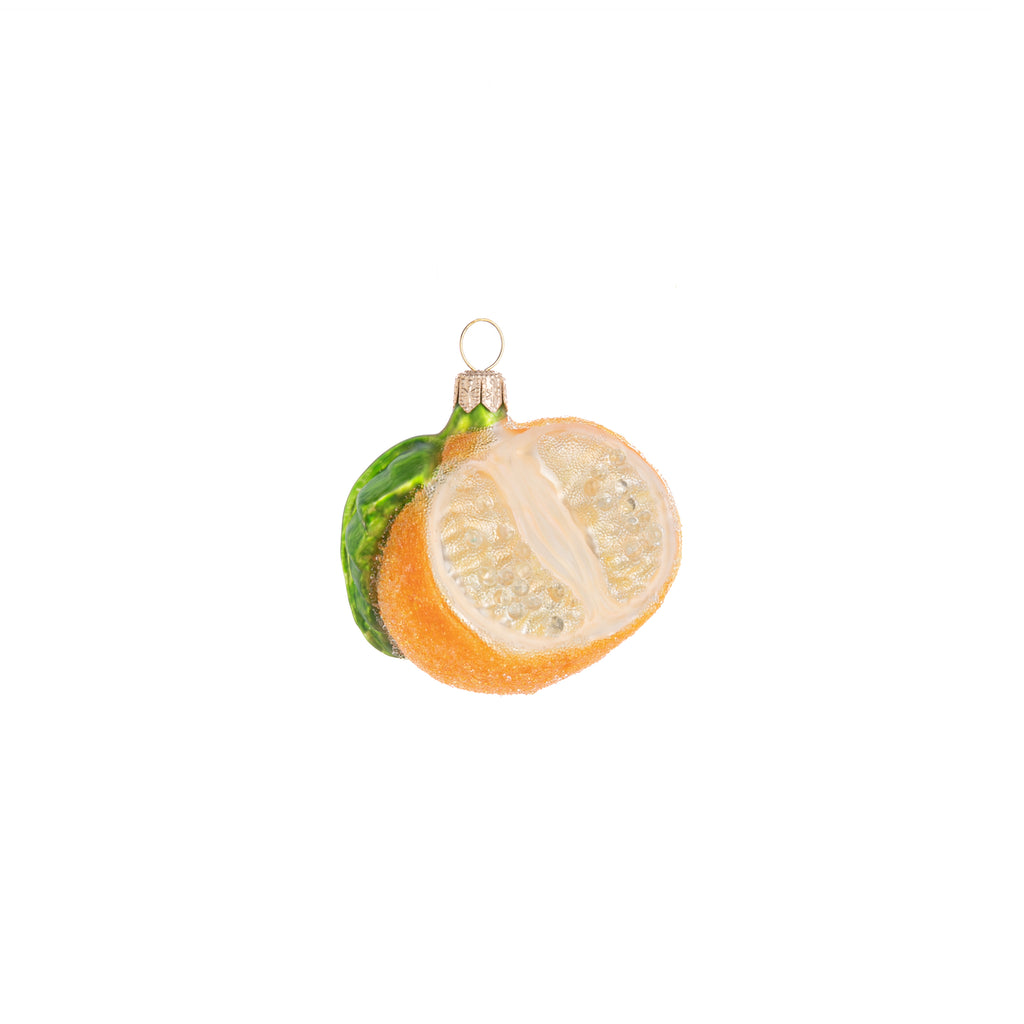 Why not celebrate the citrus with a sparkly mandarin orange as decoration? Decorated with glitter as well as enchanted frosting, this Enchanted Mandarin Orange slice ornament is a charming addition to your home and holiday decor. Hand painted glass ornament Dimensions: 2.5" x 2.2"