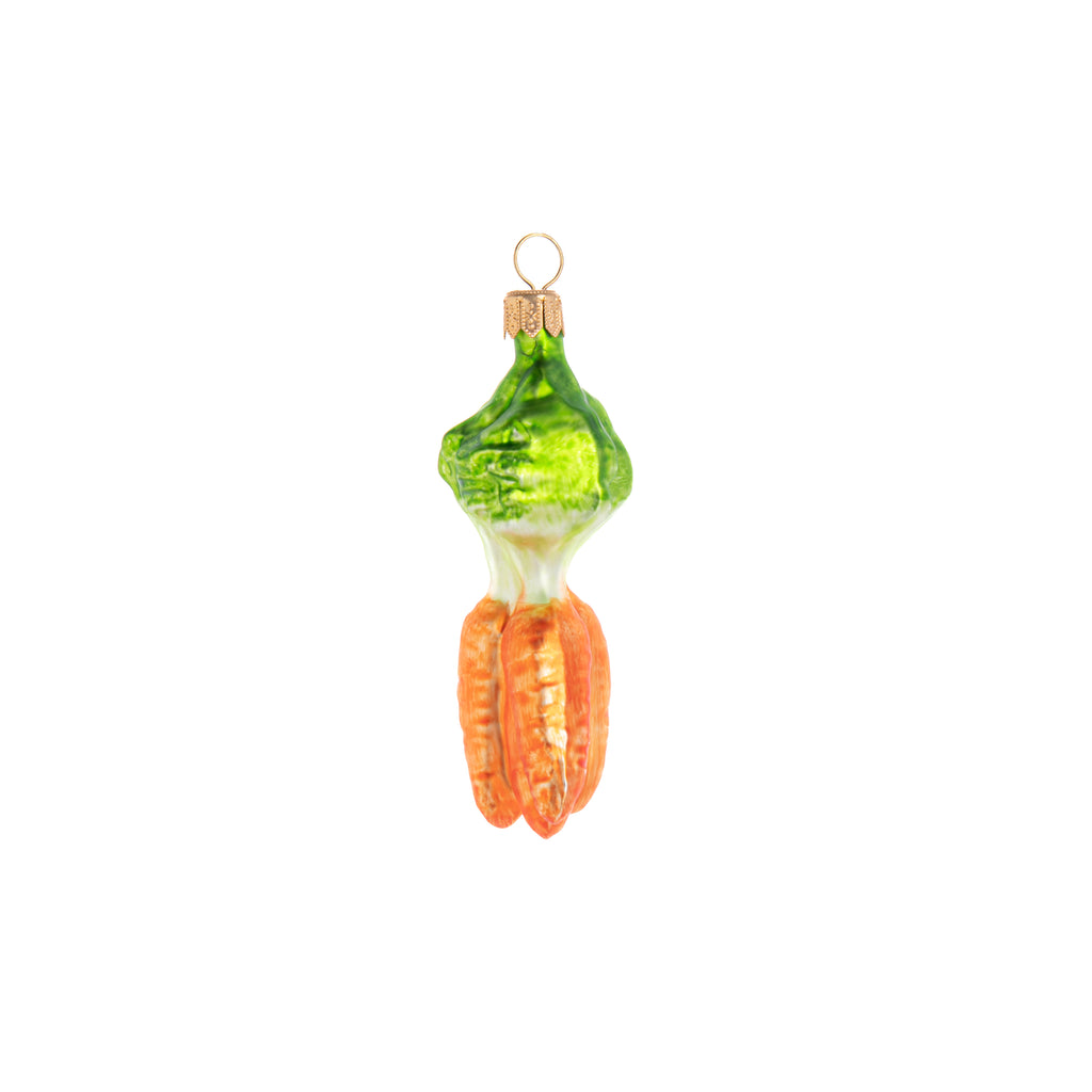 This popular root vegetable is adorable in its enchanted ornament form. Hand crafted and painted, this Enchanted Carrot Bunch ornament with its bright leafy greens and shiny orange is a great pop of color to your home and holiday decor. Hand-decorated glass ornament Dimensions: approx. 4" x 1.5"