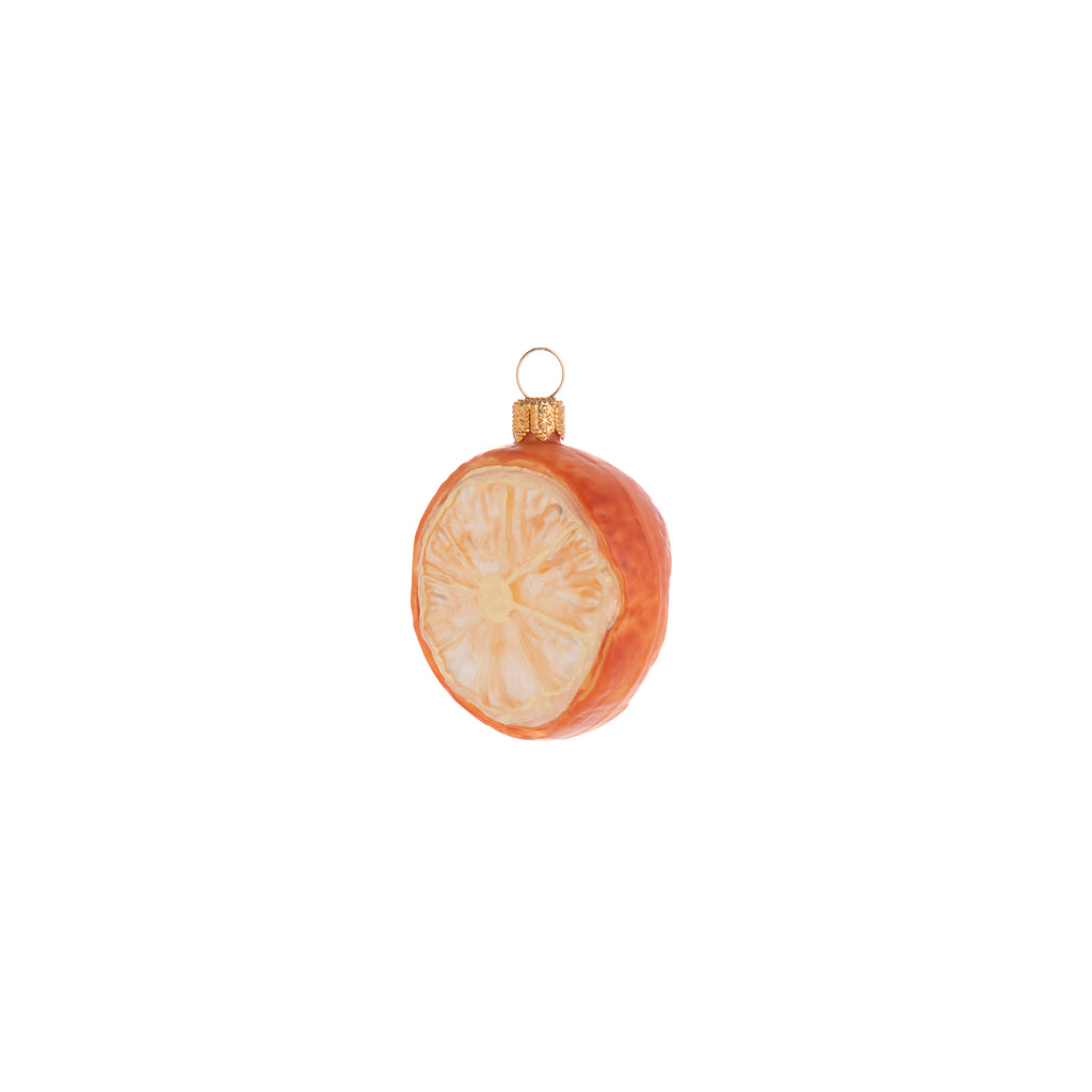 Celebrate the citrus with this slice of an adorable Enchanted Mandarin Orange! Hand crafted and painted, this Enchanted Mandarin Orange slice ornament is a very sweet addition to your home and holiday decor. Hand painted glass ornament Dimensions: 2.5" x 2"